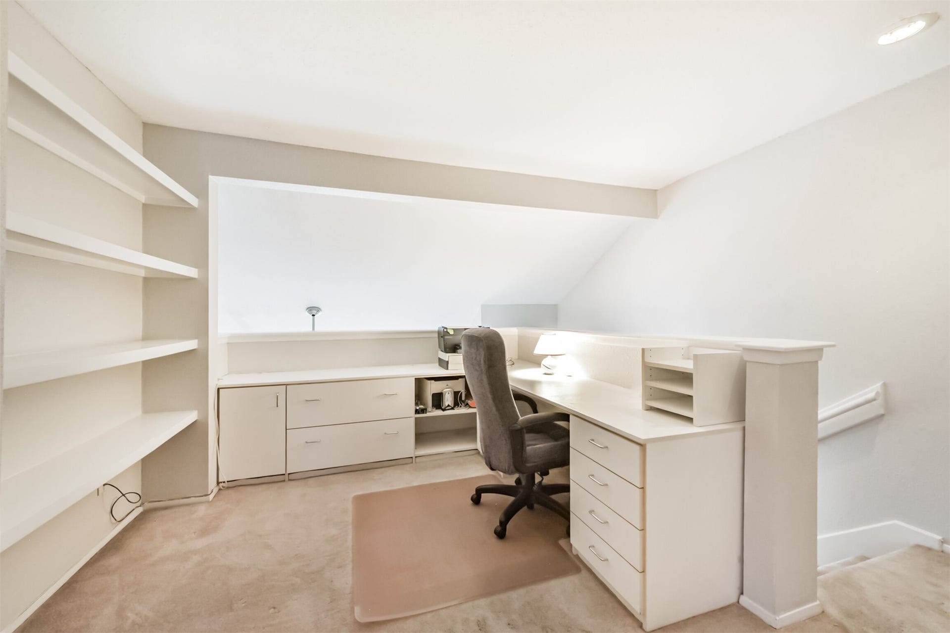 Top of stairs is the loft currently used as a home office/study but could be anything you need ... workout machines, gaming area, or whatever you need it to be.  Desks have been added and could be removed.