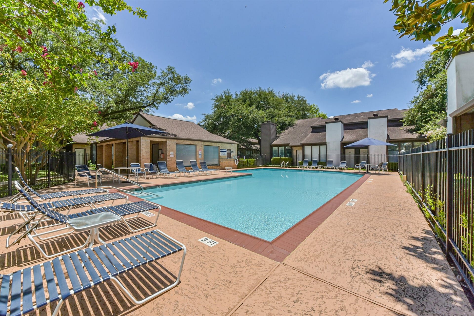 Beautiful community pool and clubhouse.  Imagine hanging out with friends here, but never having to maintain it.
