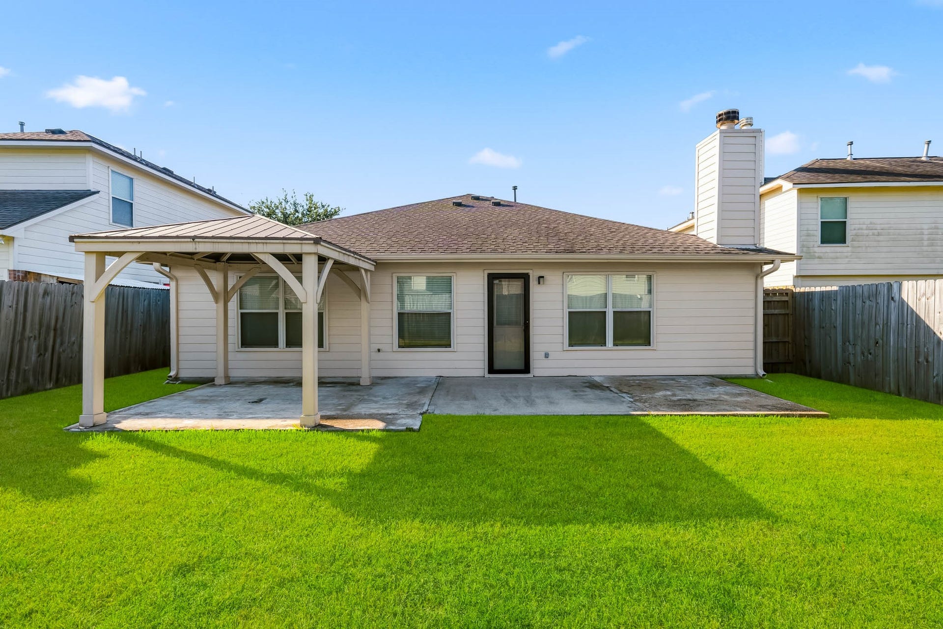 18126 Brightwood Park Lane, Richmond, TX 77407 Generously sized fenced backyard with plenty of room to relax, play, or entertain.