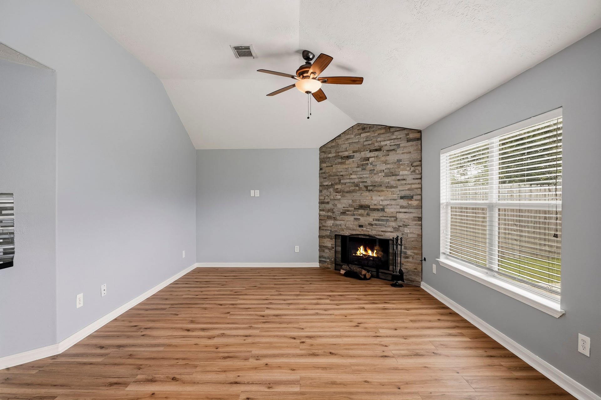 18126 Brightwood Park Lane, Richmond, TX 77407 Abundant natural light fills the open family area, creating a bright and welcoming atmosphere.