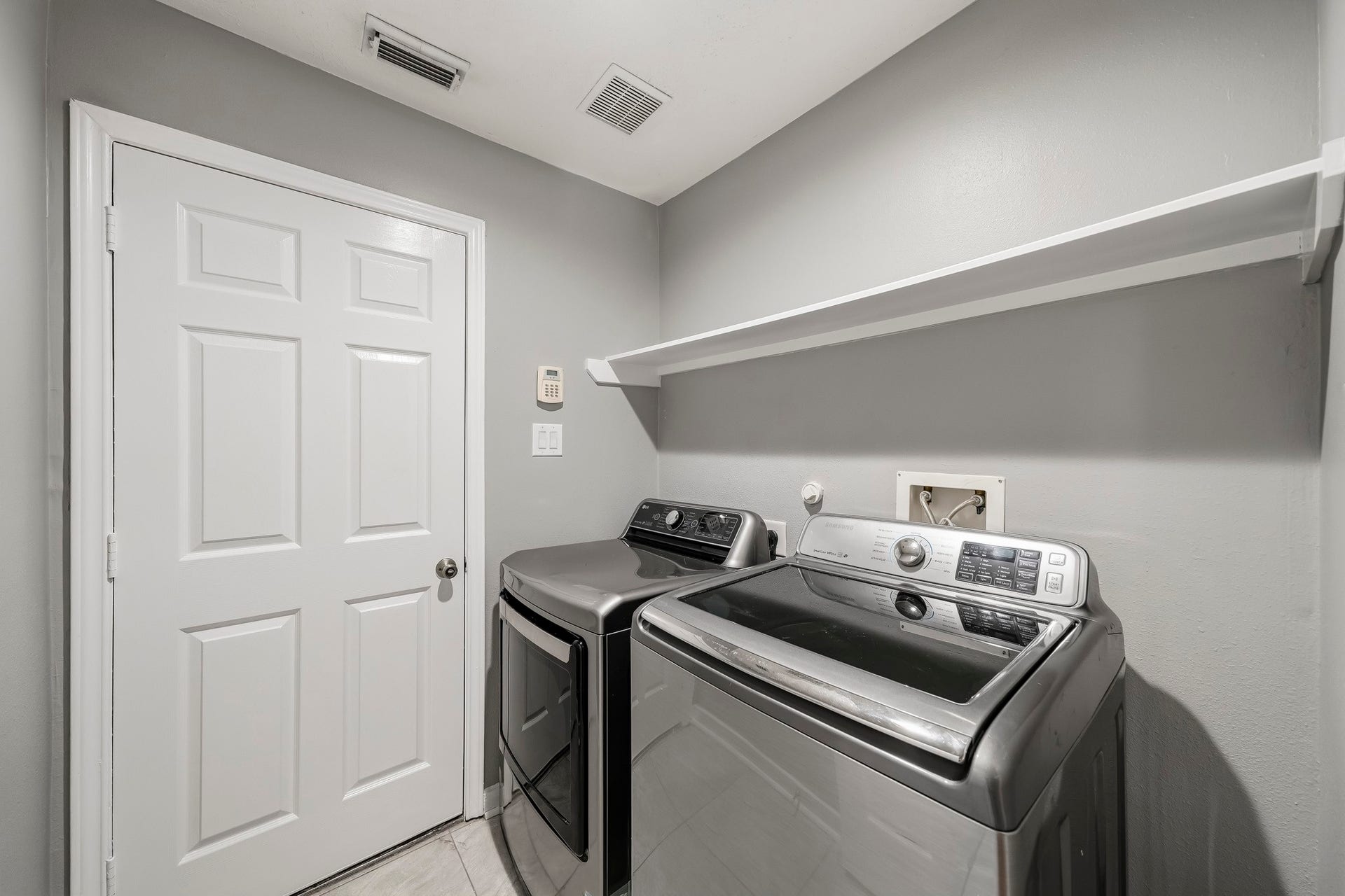 18126 Brightwood Park Lane, Richmond, TX 77407 Dedicated indoor utility room offers convenient laundry space and additional storage.