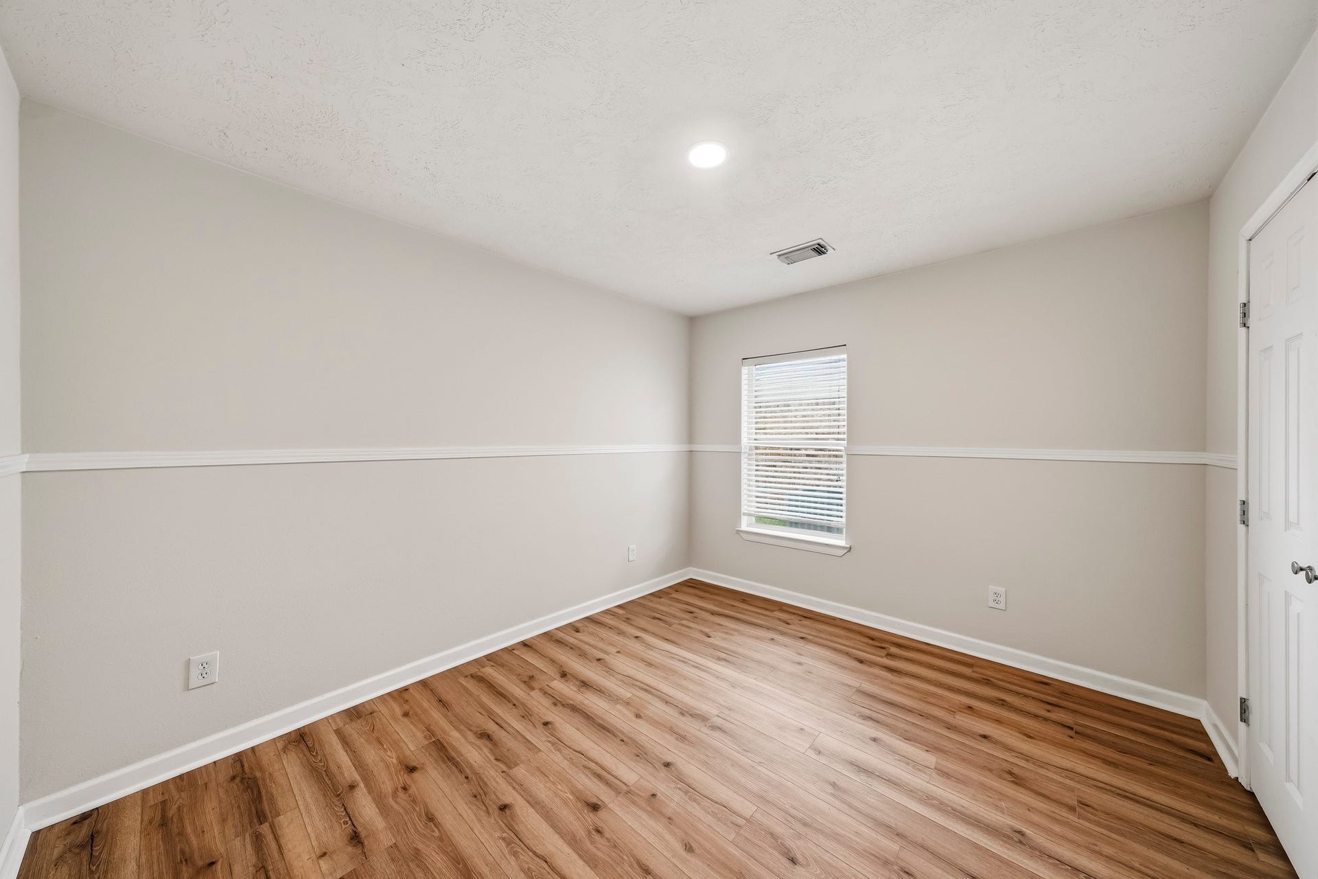 18126 Brightwood Park Lane, Richmond, TX 77407 Spacious secondary bedroom provides flexibility for guests, family, or a home office.