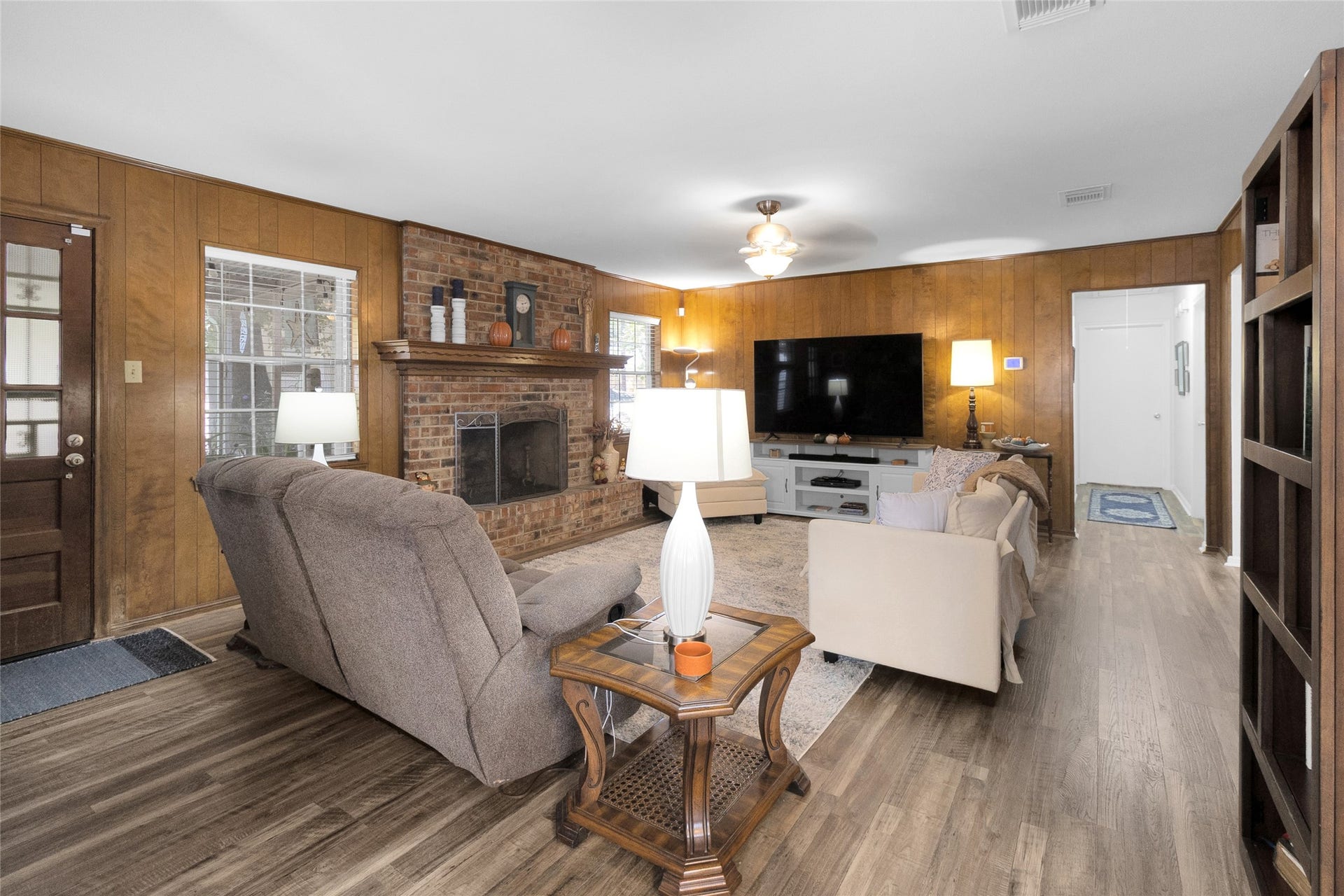 613 N Avenue F, Humble, TX 77338 Full view of the generously sized living room, showcasing its spacious layout and ample room for comfortable seating, relaxation, and entertaining guests.