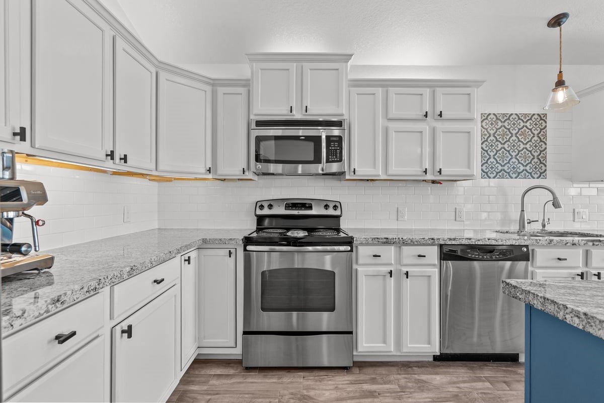 Stunning Kitchen with Beautiful Cabinetry and Countertops - Light & Bright!