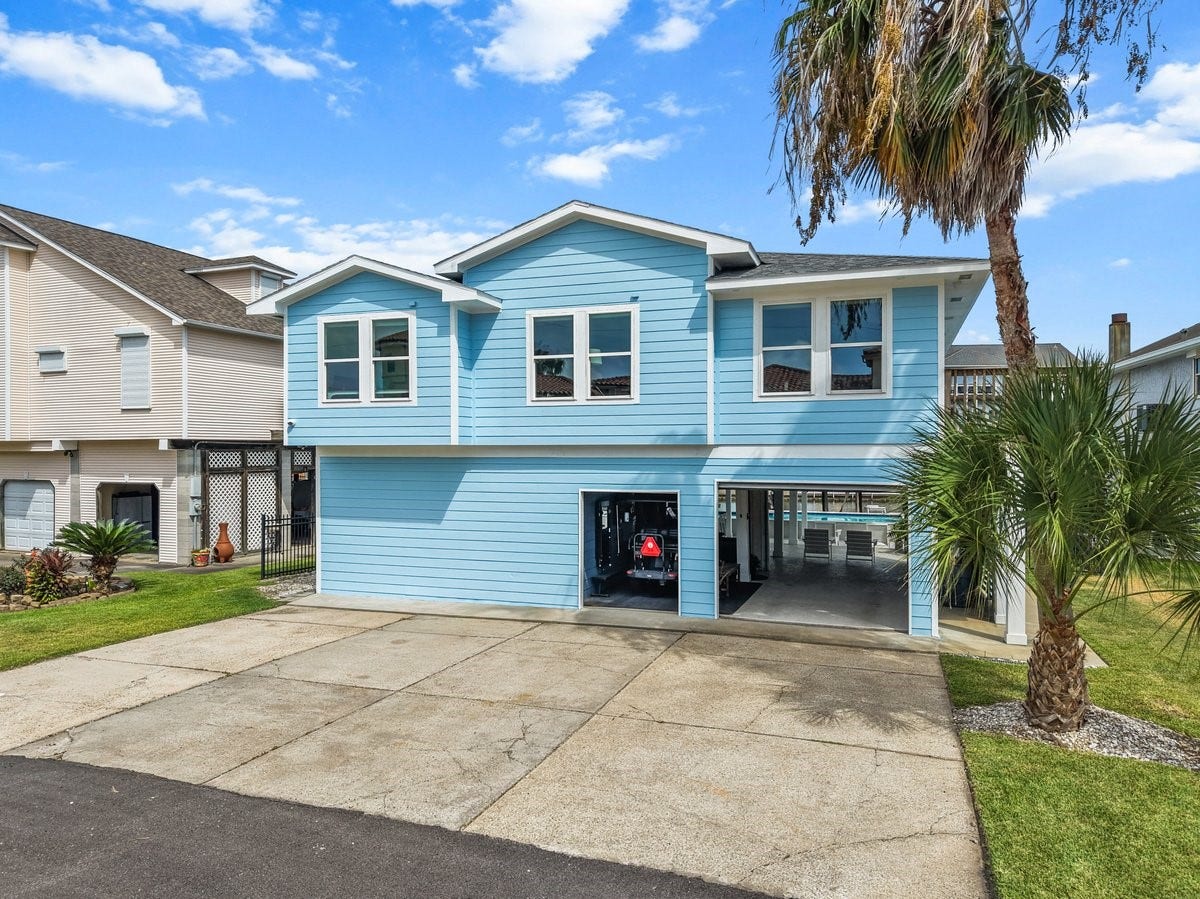 Wide Driveway and Expansive Under House Area perfect for Parking or Outdoor Entertaining.