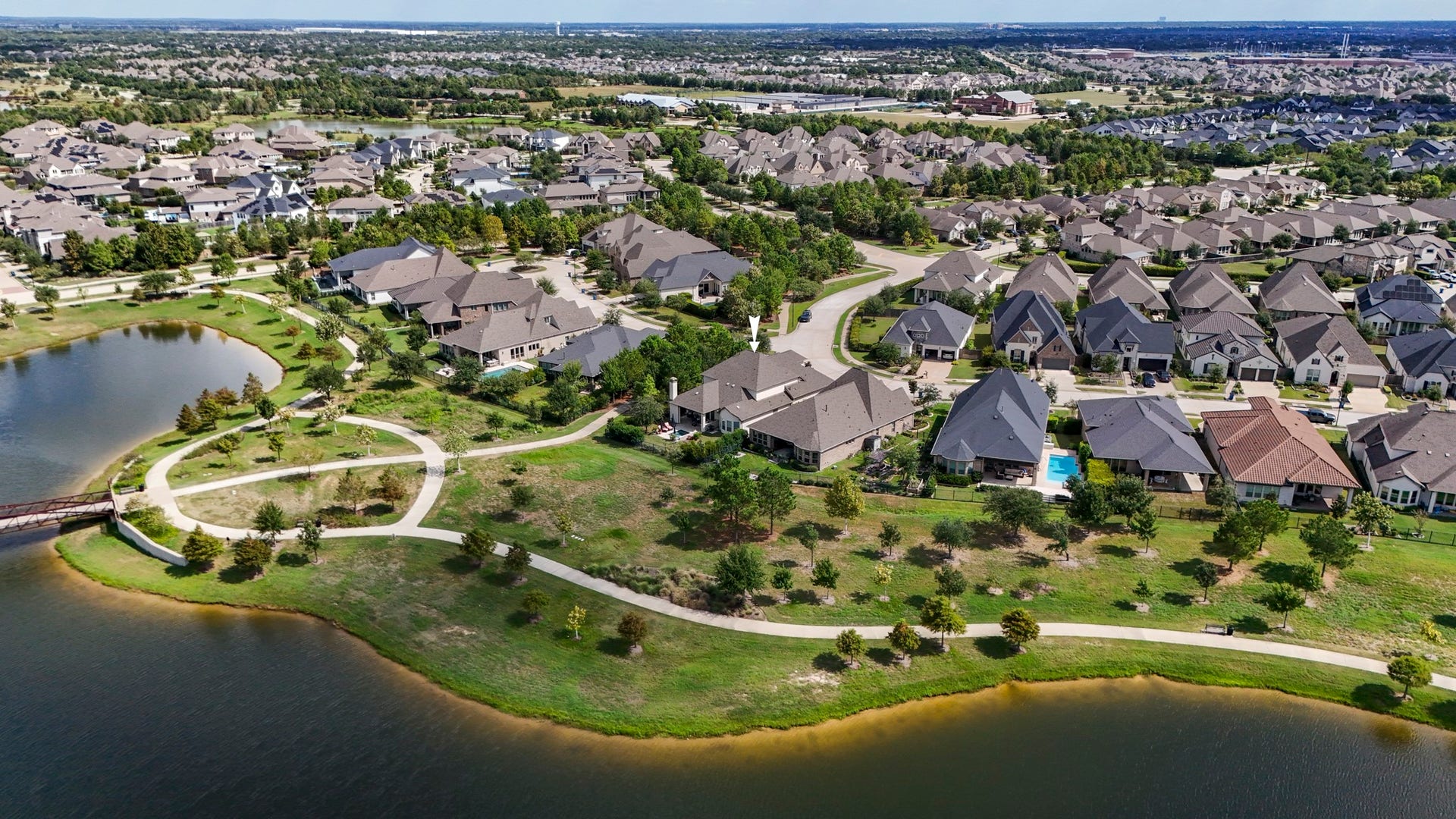 From the lake...so much space behind your home!