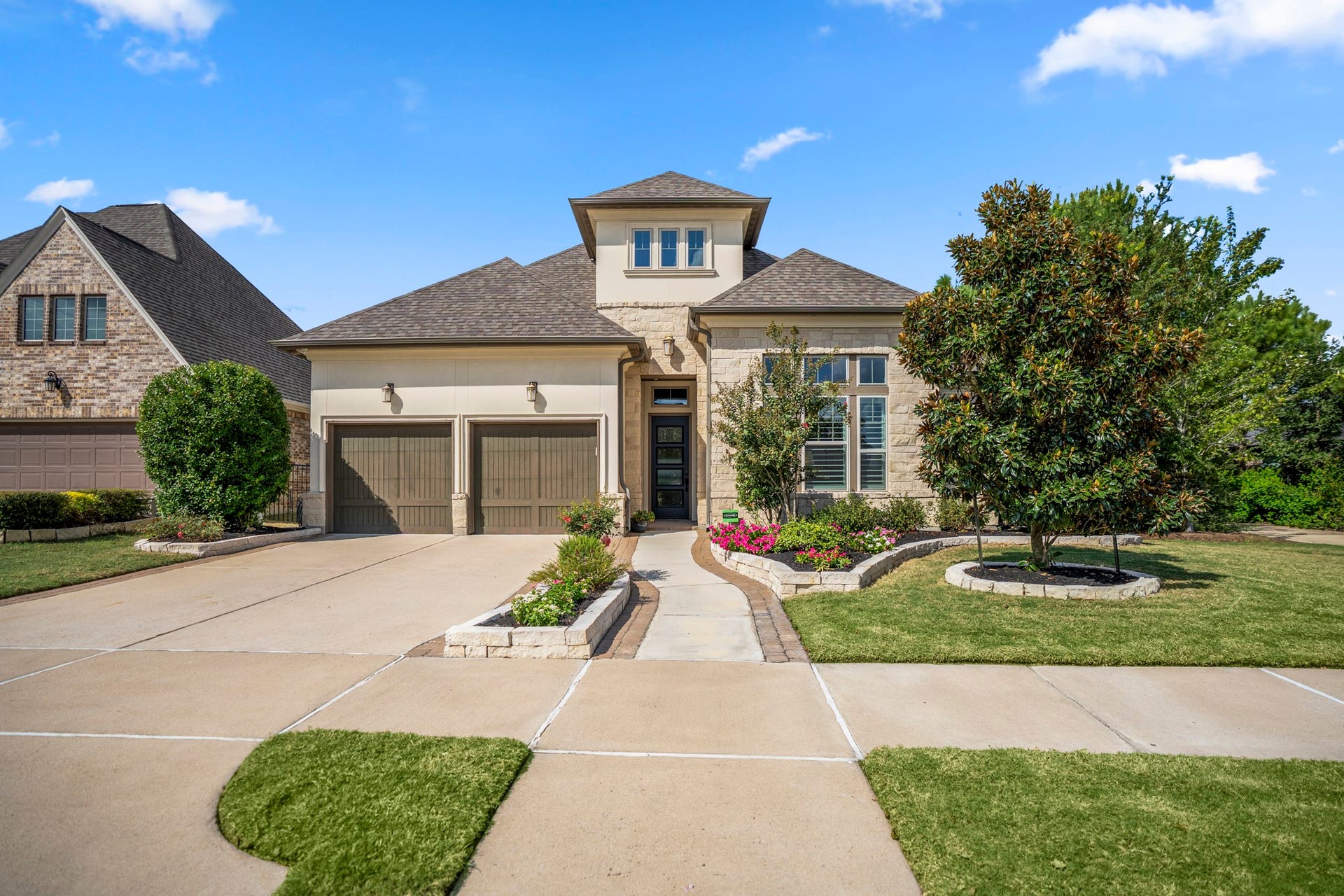 Welcome to this WATERFRONT Darling home, next to a greenbelt (right) in Cedar Hill of Parkland at Bridgeland!  The home has a 3 car tandem garage.