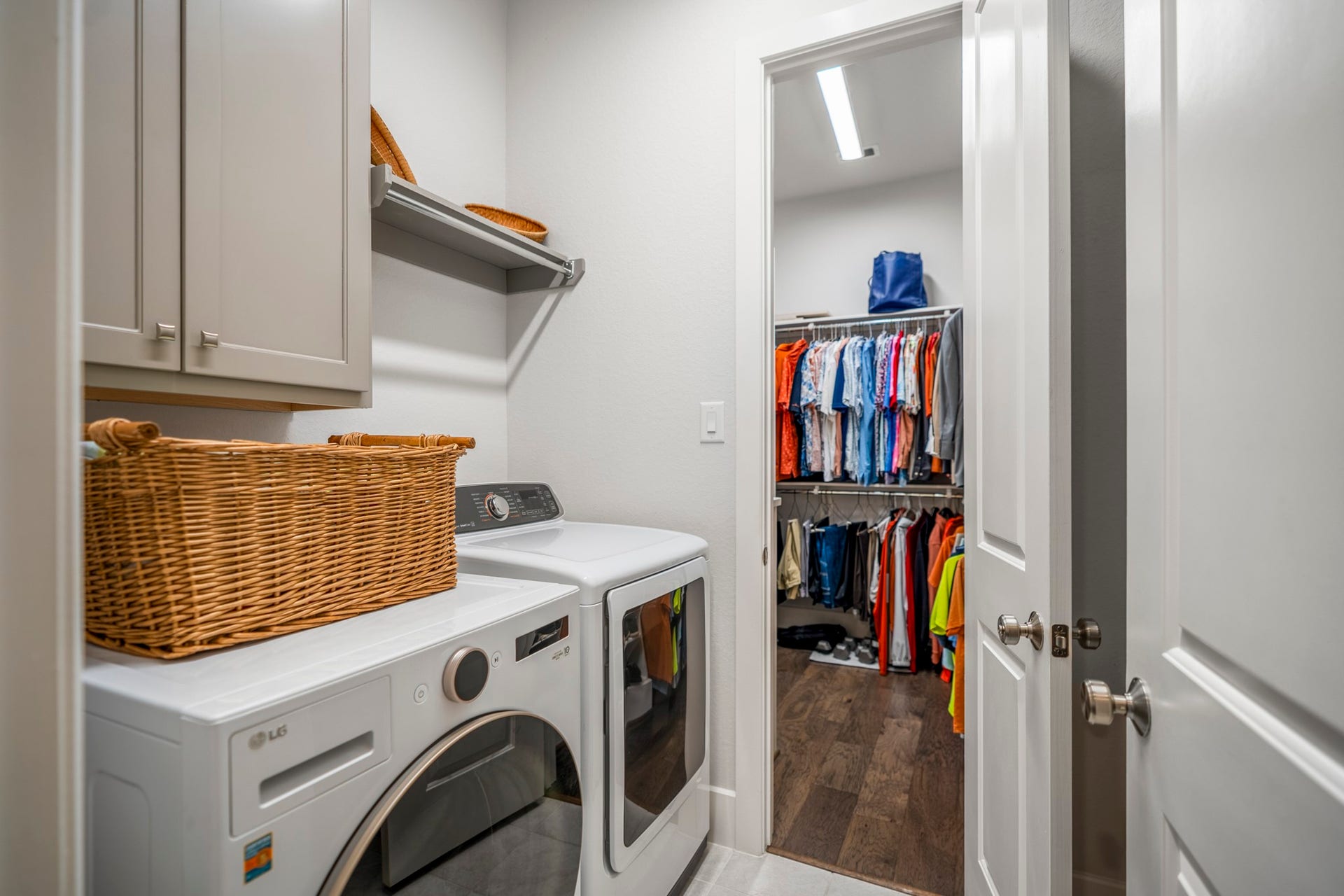 The laundry room opens to the primary closet, so convenient!