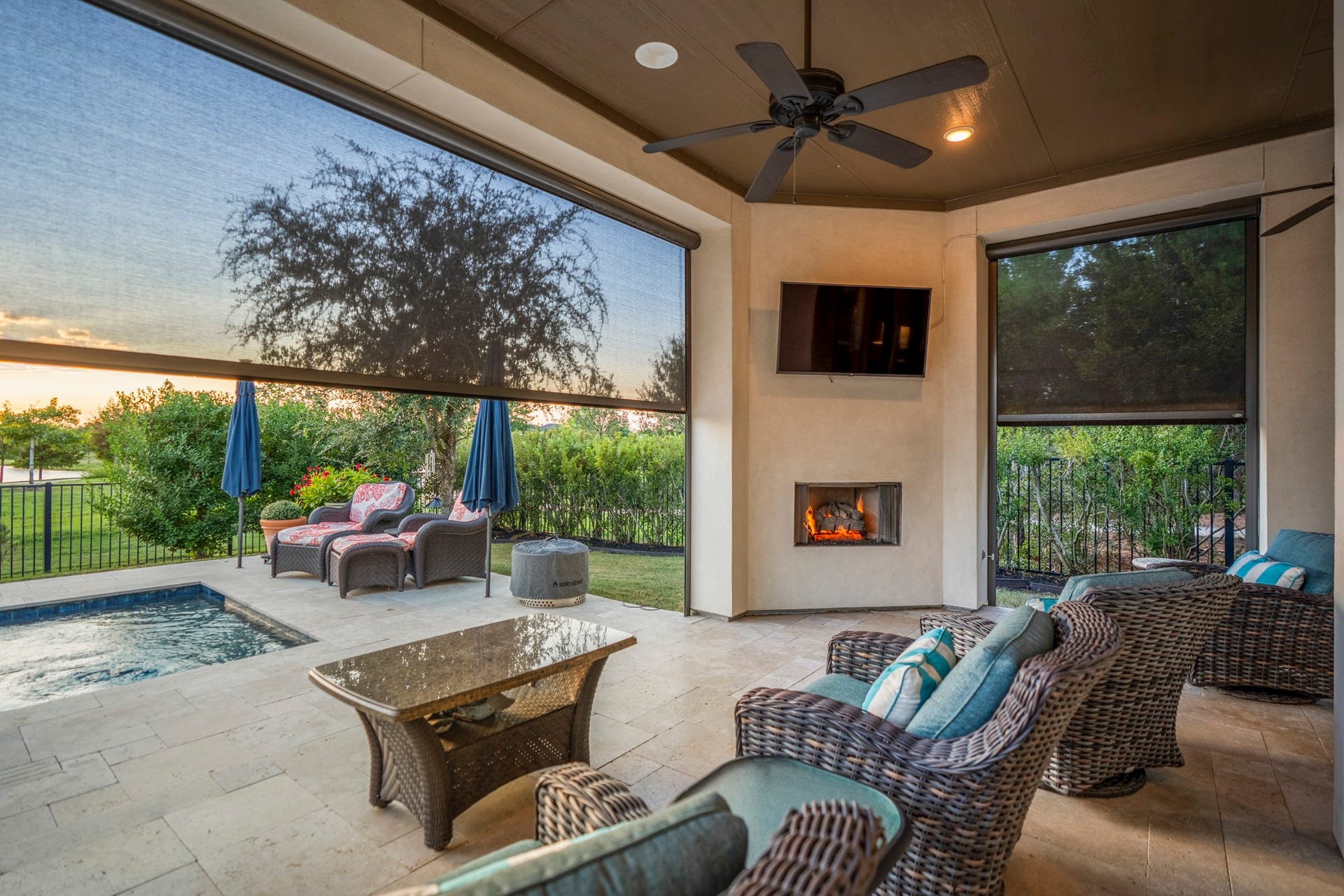 The cozy gas fireplace helps make this a space to enjoy year-'round.