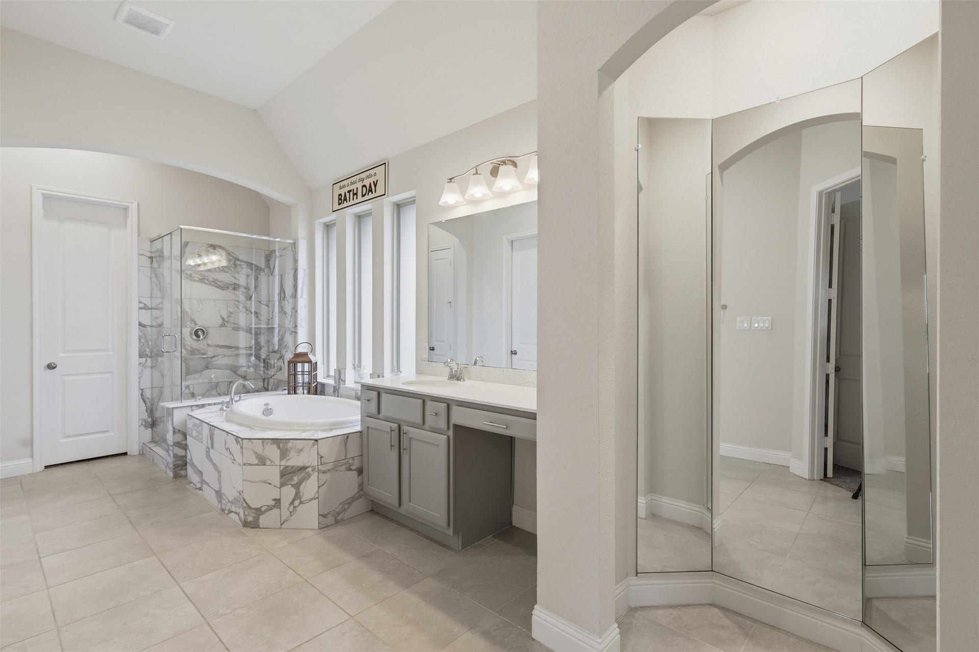 29622 Pewter Run Lane, Katy, TX 77494 Dual vanities, soaking tub, and elegant finishes in the primary bath.