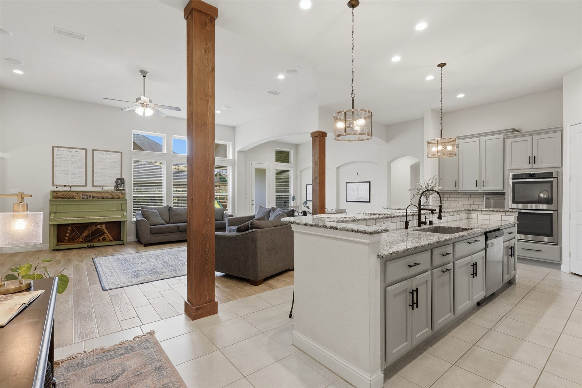 29622 Pewter Run Lane, Katy, TX 77494 Spacious island kitchen with light countertops and stainless steel appliances.