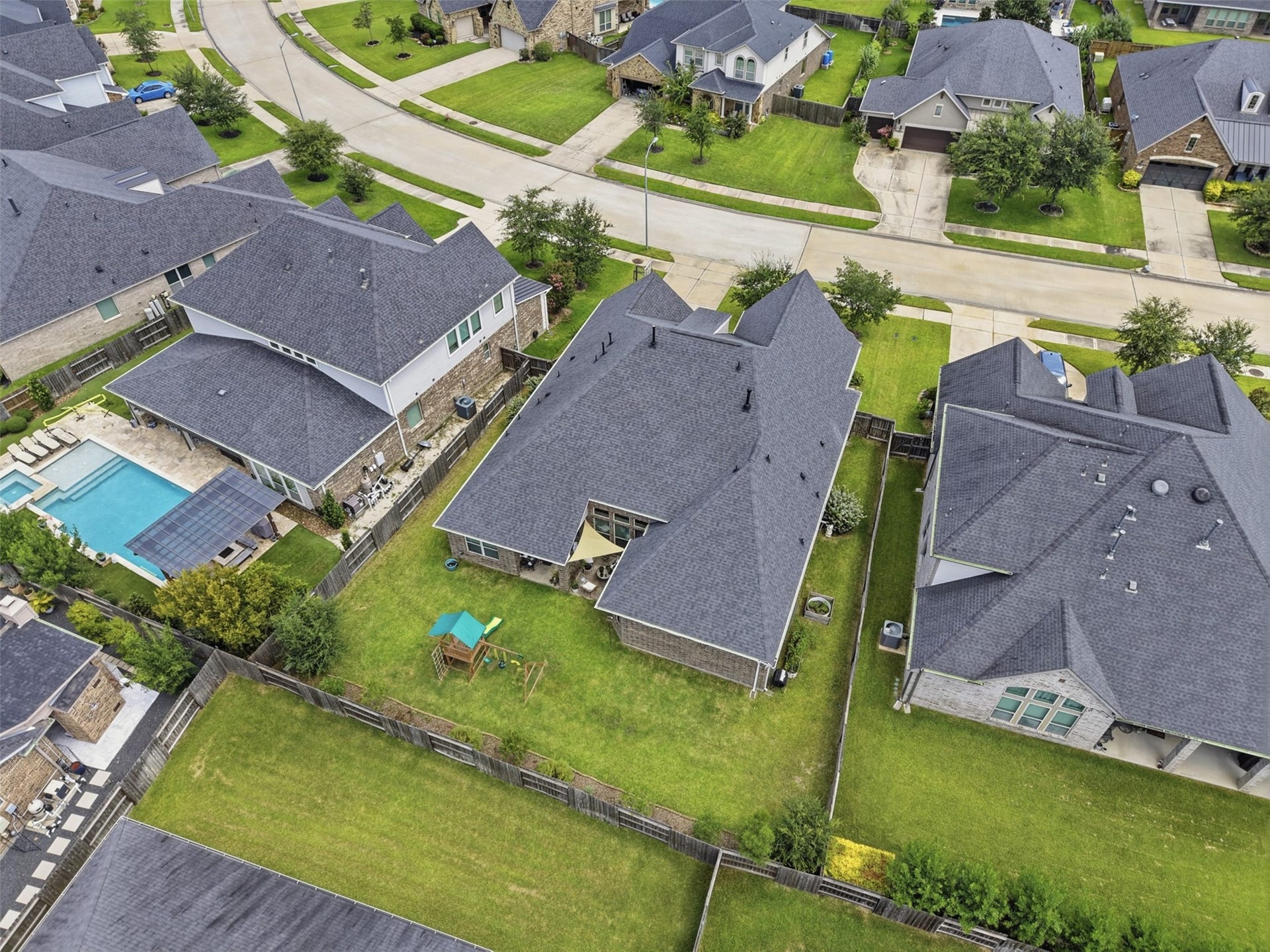 29622 Pewter Run Lane, Katy, TX 77494 Rear elevation showcasing the covered patio and expansive yard.