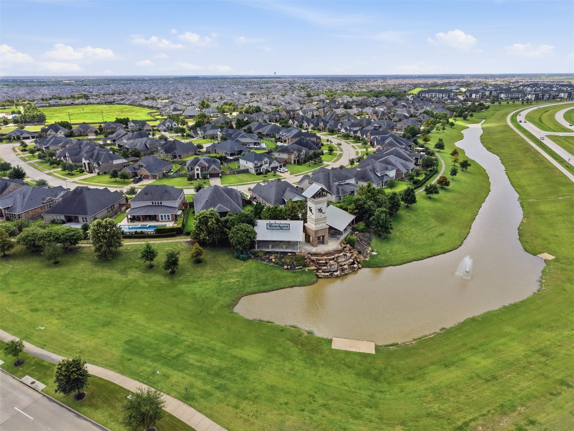 29622 Pewter Run Lane, Katy, TX 77494 Neighborhood aerial showcasing nearby homes and green space.