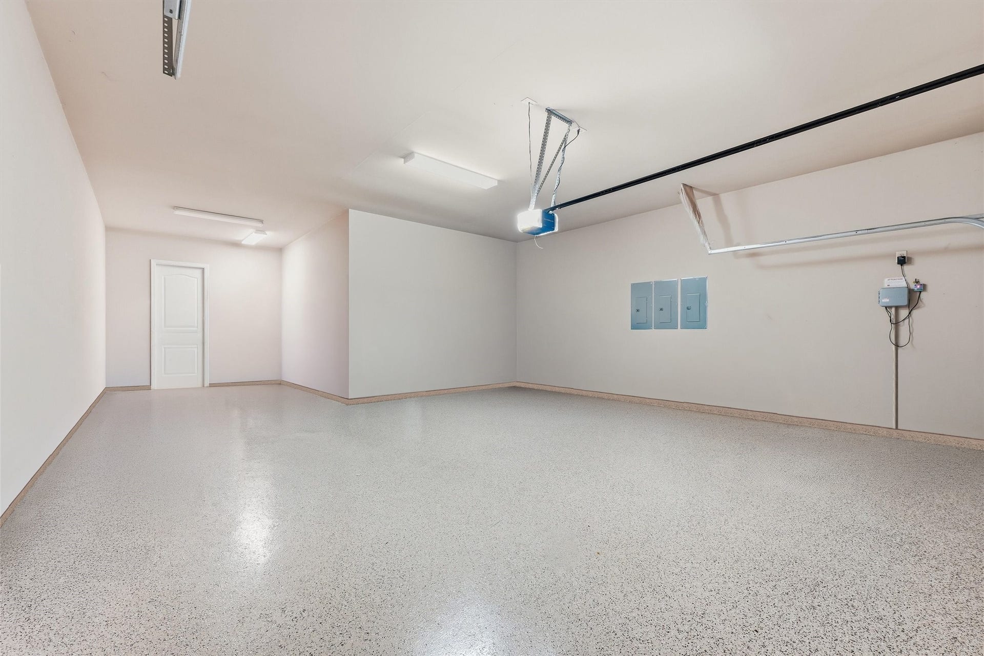 17215 Sages Ravine Drive, Humble, TX 77346 Epoxy Flooring in 3-Car Tandem Garage