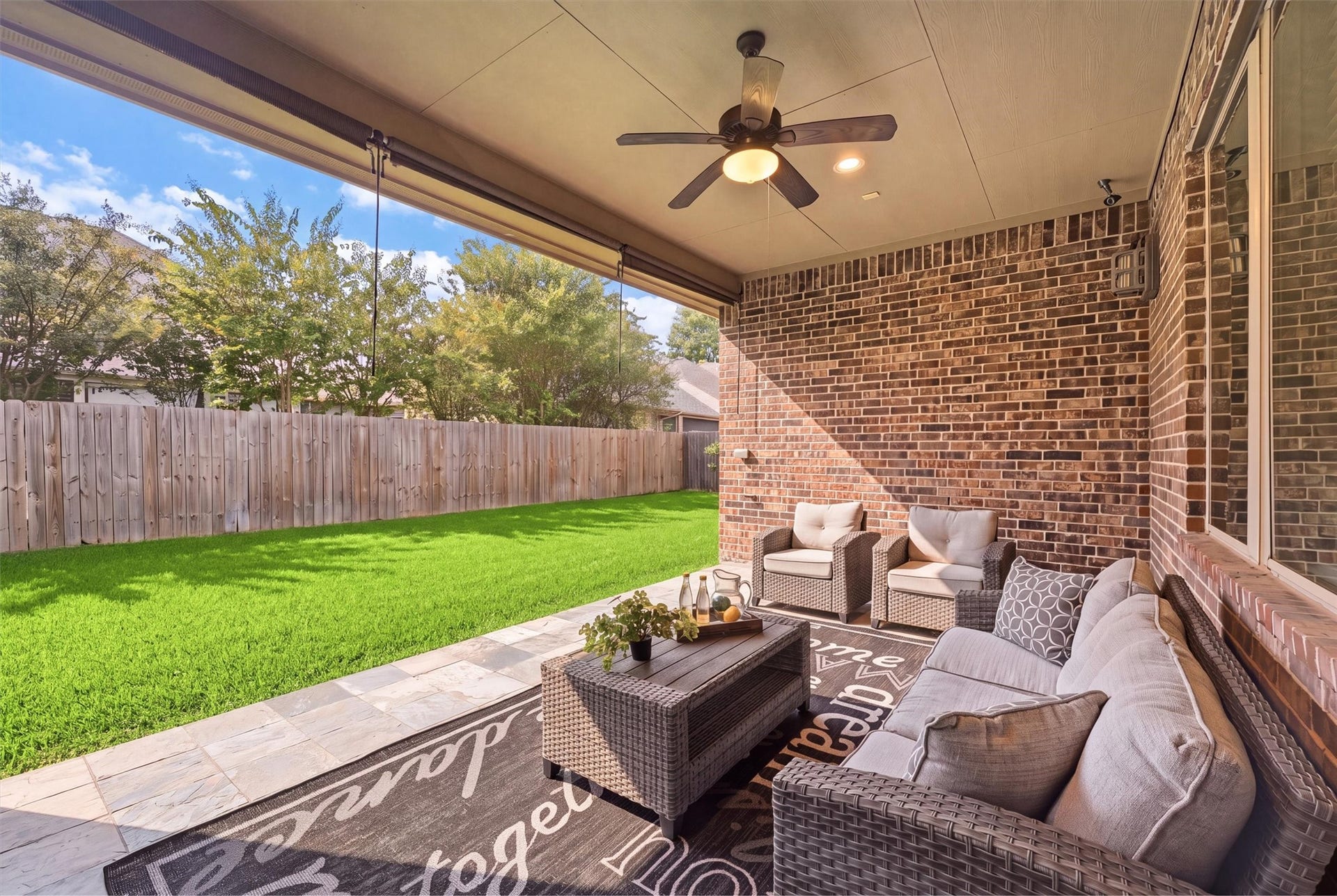 17215 Sages Ravine Drive, Humble, TX 77346 Covered Patio with Tile Flooring & Ceiling Fan
