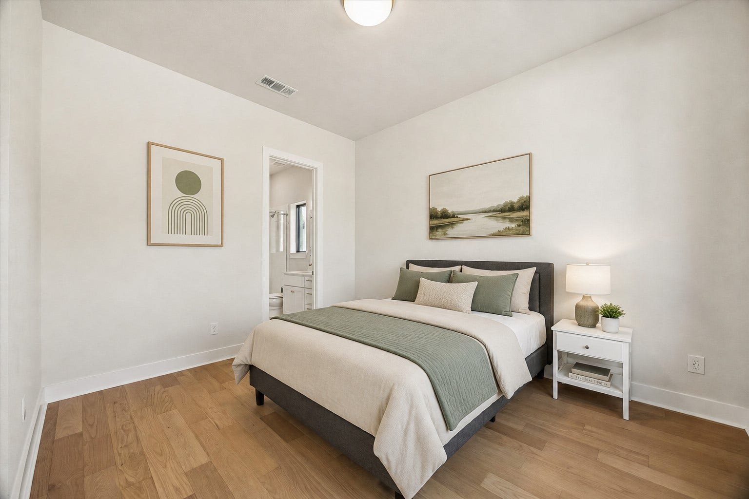 AN ADDITIONAL SECONDARY BATHROOM IS DOWNSTAIRS - FEATURES WOOD FLOORING, NEUTRAL FINISHES, AND DIRECT ACCESS TO A PRIVATE BATH. **Virtually Staged.