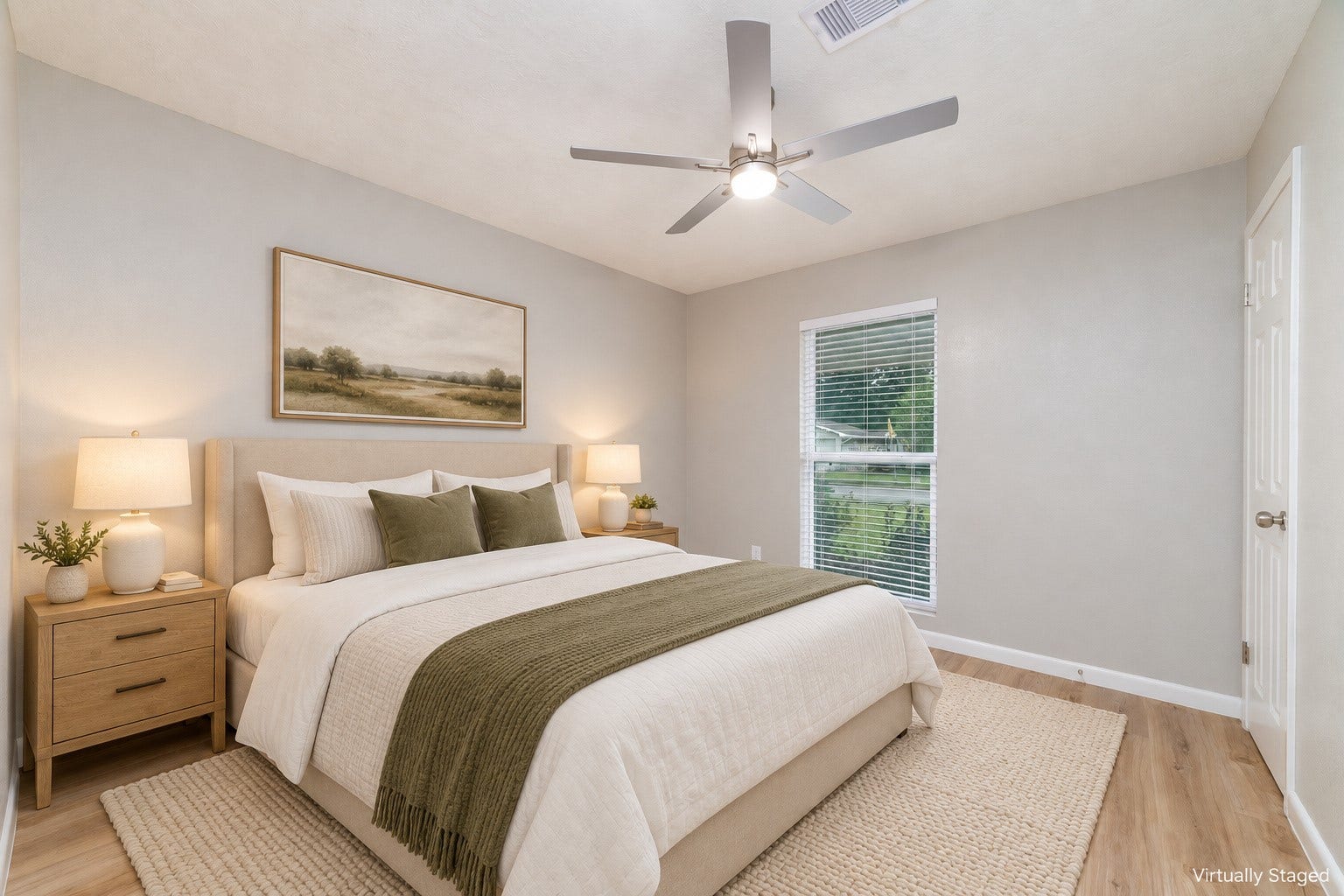 2830 Westerland Drive, Houston, TX 77063 Guest bedroom one, imagined with soft linens, warm wood and a little hotel comfort for the people you love. Virtually staged.