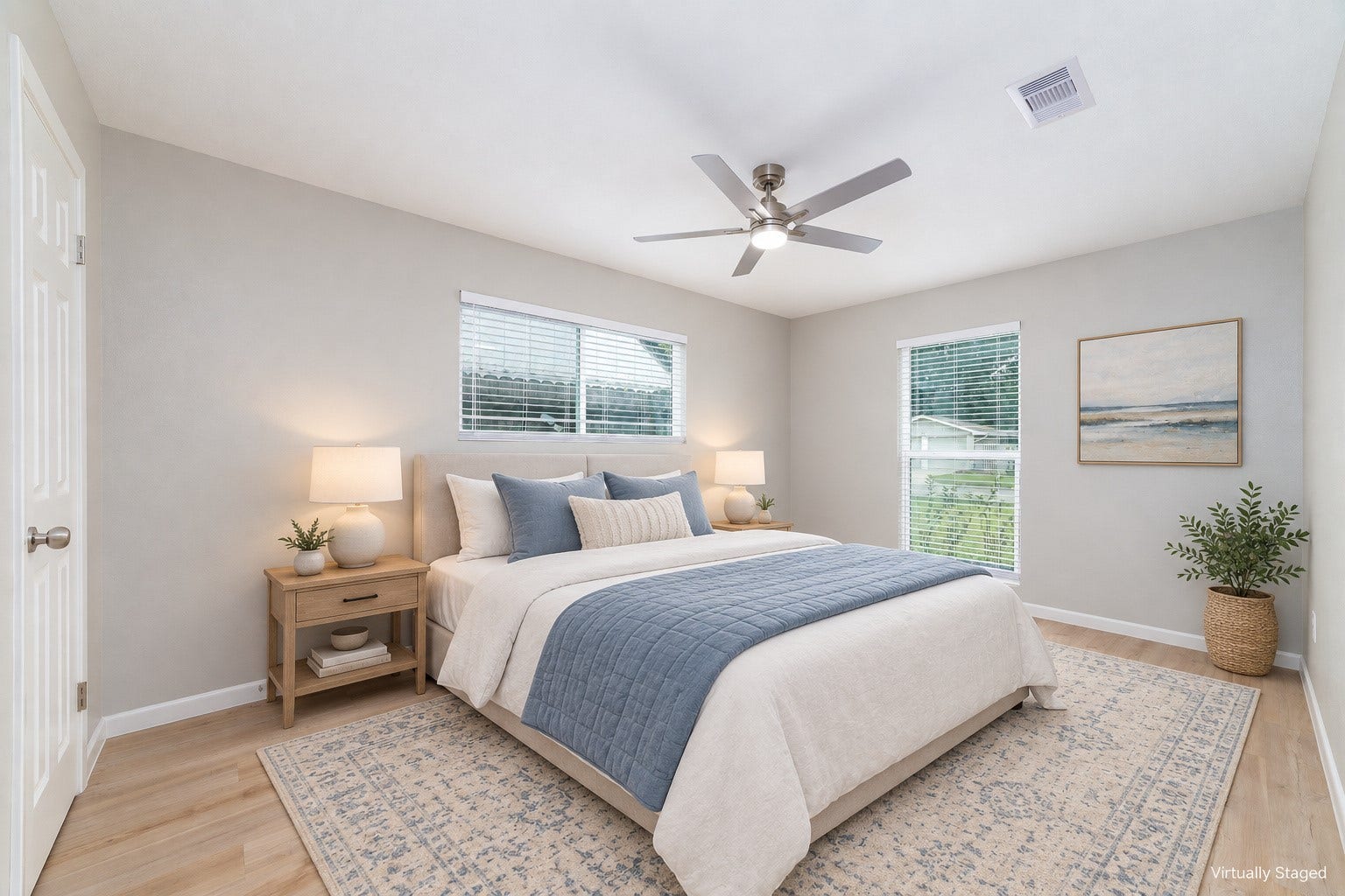 2830 Westerland Drive, Houston, TX 77063 Soft blue accents suit this sunlit second guest bedroom, with new double-pane windows on two walls. Virtually staged.