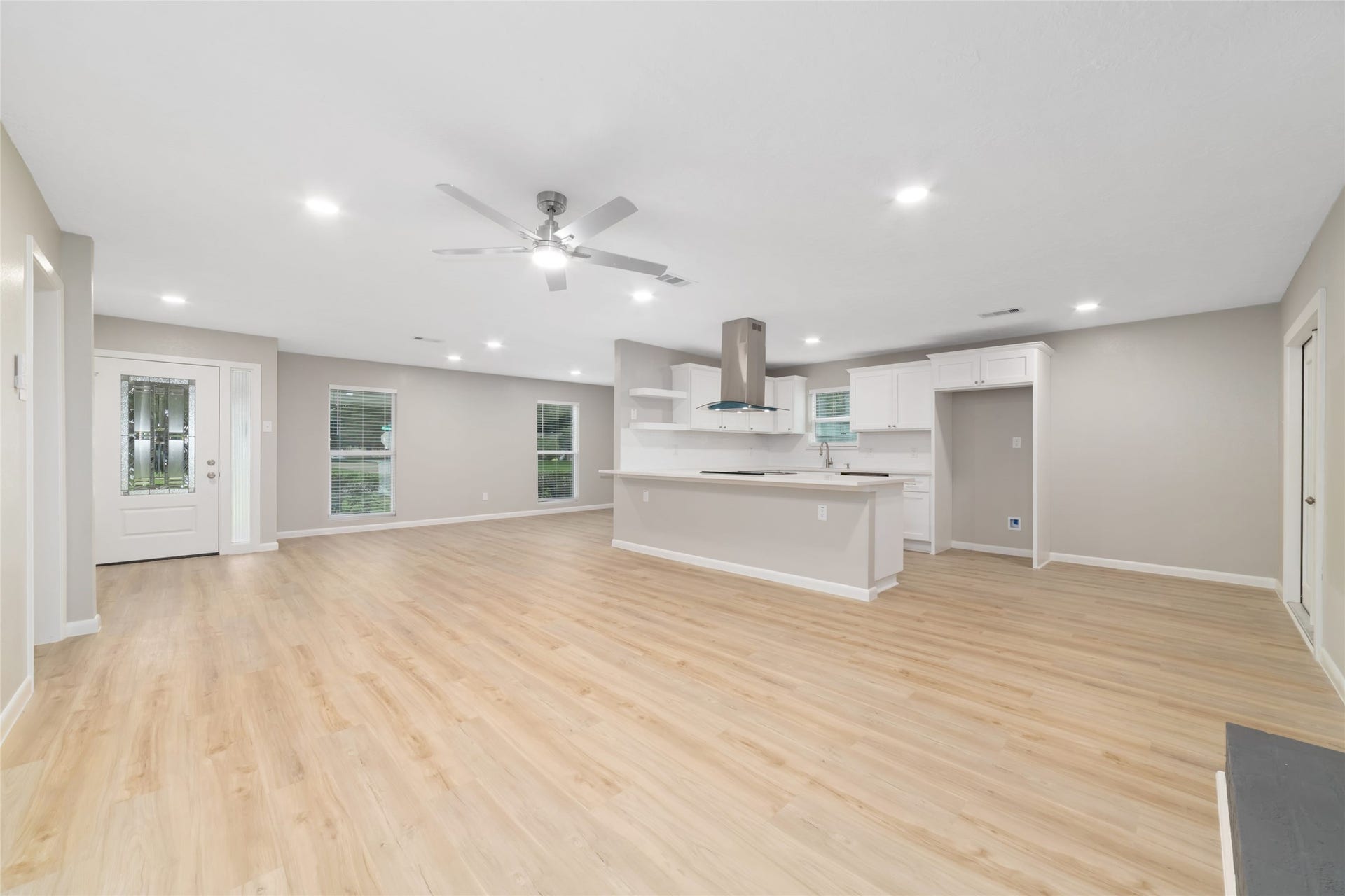 2830 Westerland Drive, Houston, TX 77063 Spacious open floorplan gives room to give the dining table and the lounging crowd their own space.