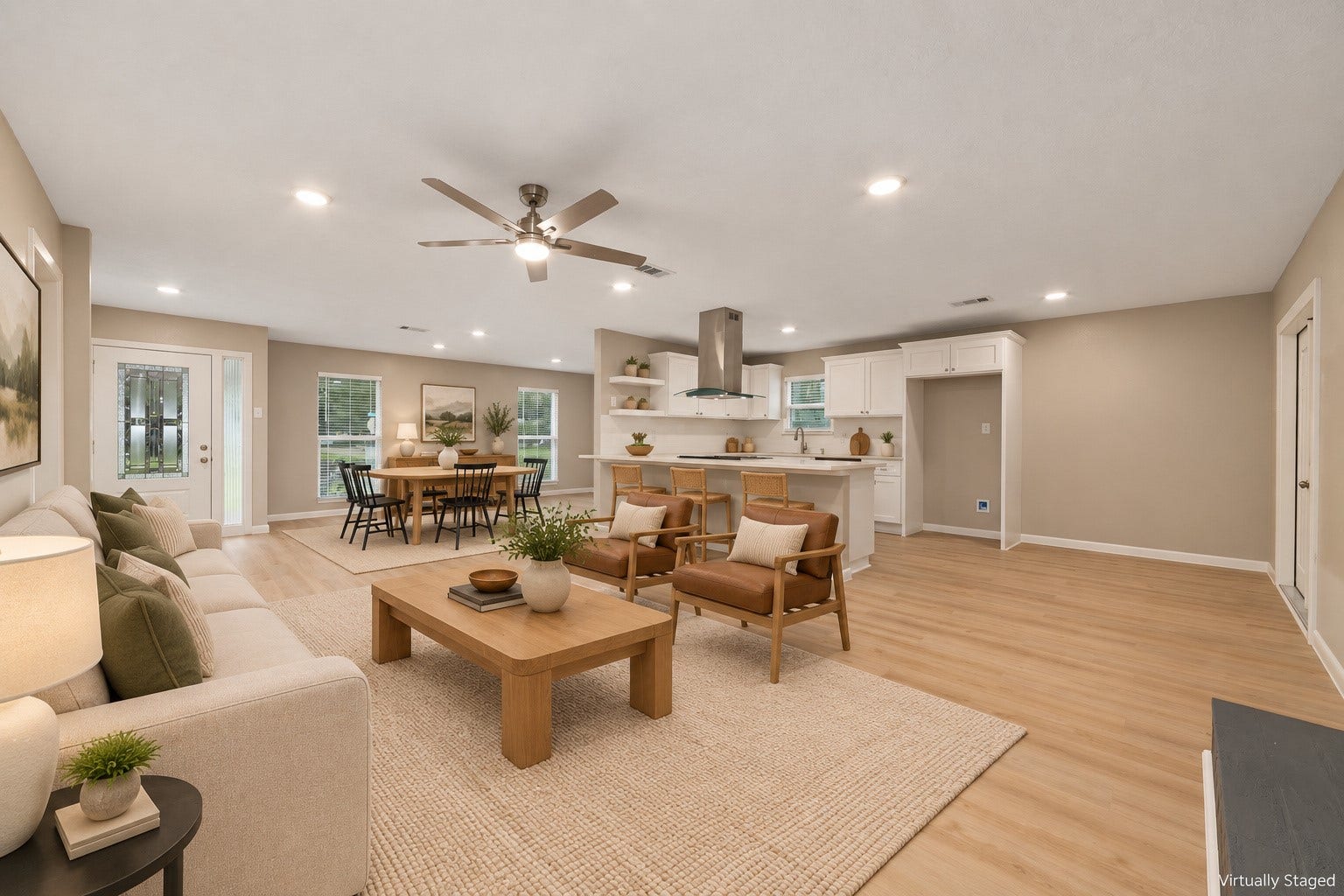 2830 Westerland Drive, Houston, TX 77063 Warm-toned LVP floors connect the living and dining areas. Bring your favorite pieces and make yourself at home. Virtually staged.
