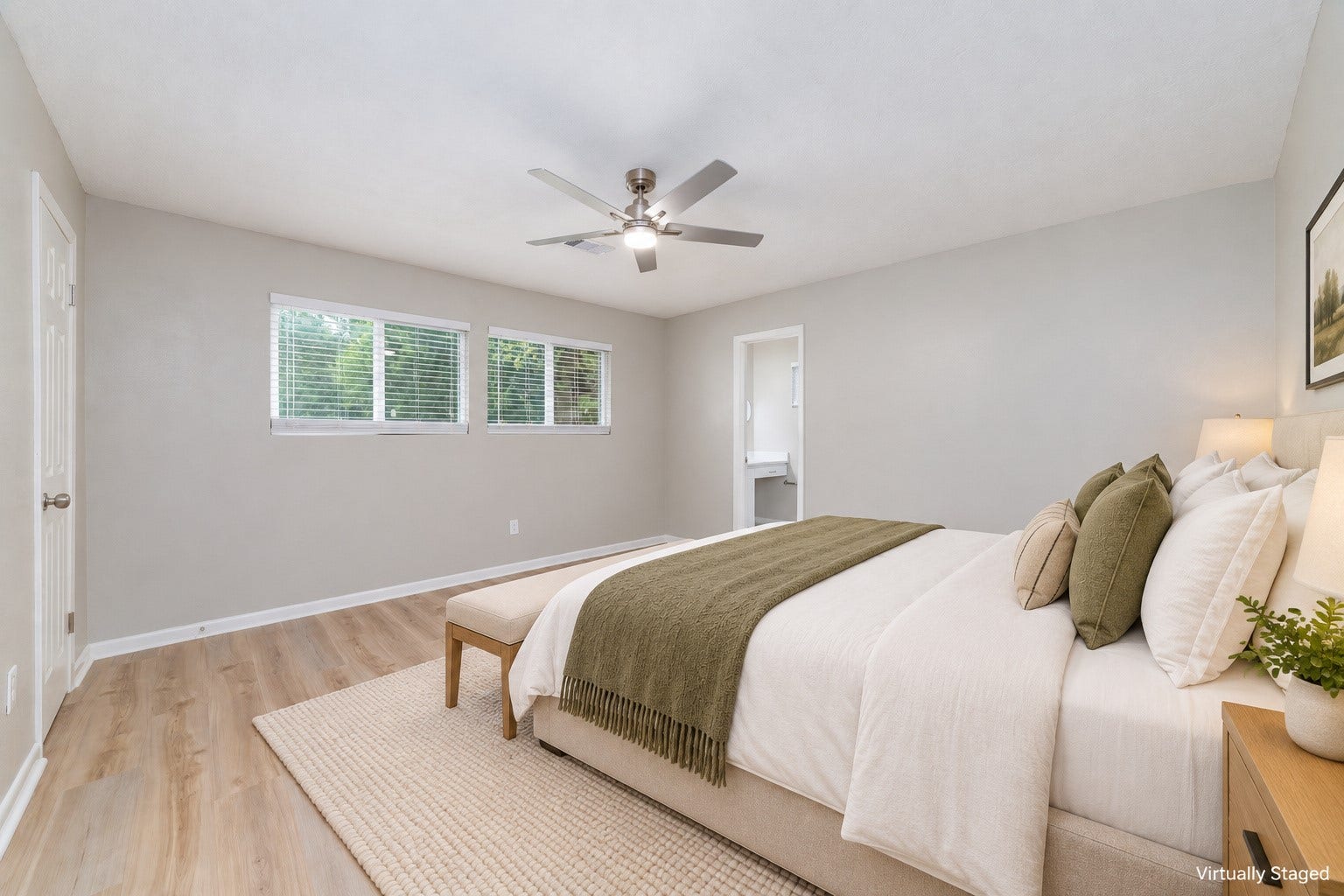2830 Westerland Drive, Houston, TX 77063 Slow mornings belong here. Natural light, warm LVP floors and a private bath just steps from bed. Virtually staged.