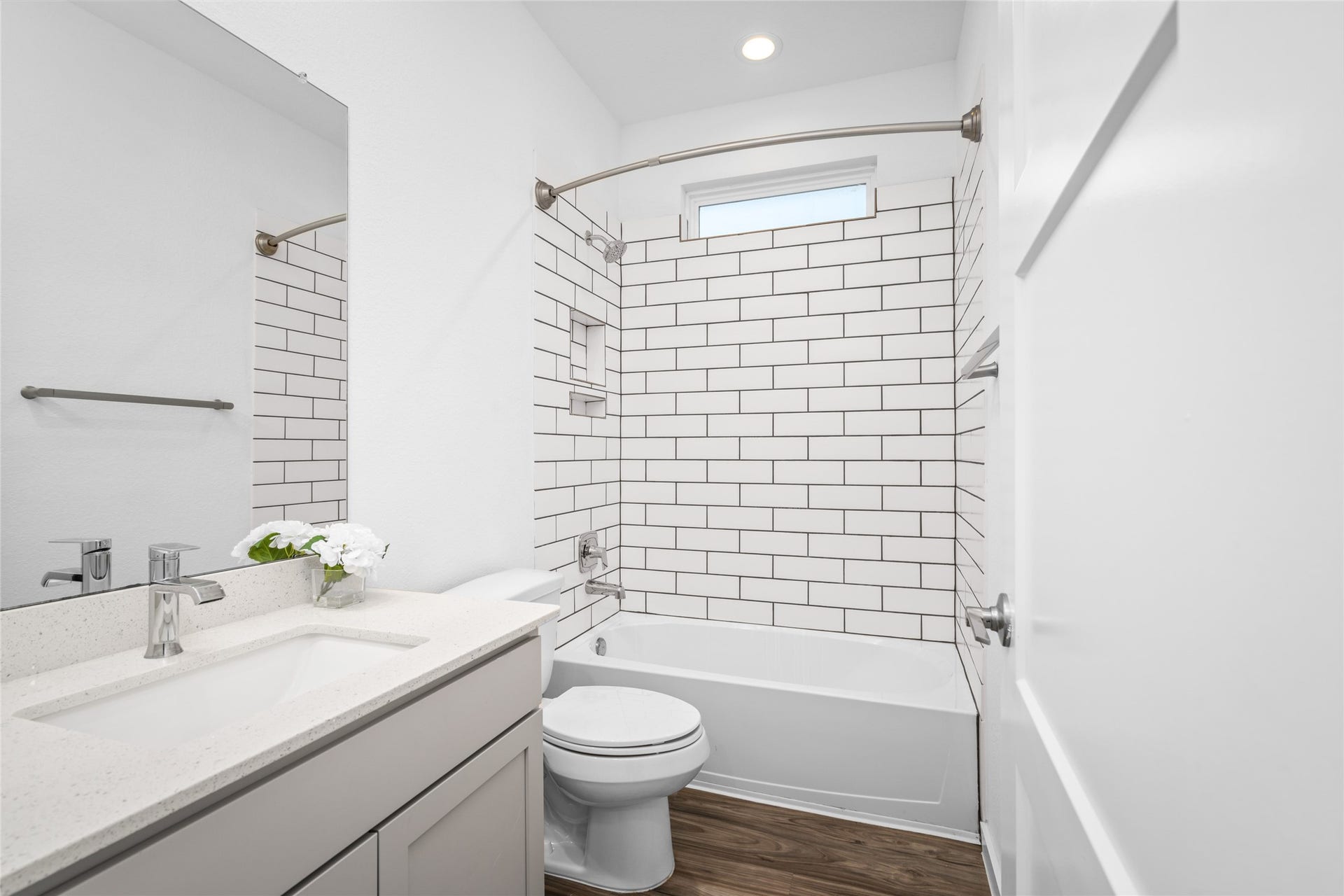 22514 Loreto Costa Lane, Katy, TX 77449 Secondary bathroom with subway tile and tub/shower combo.