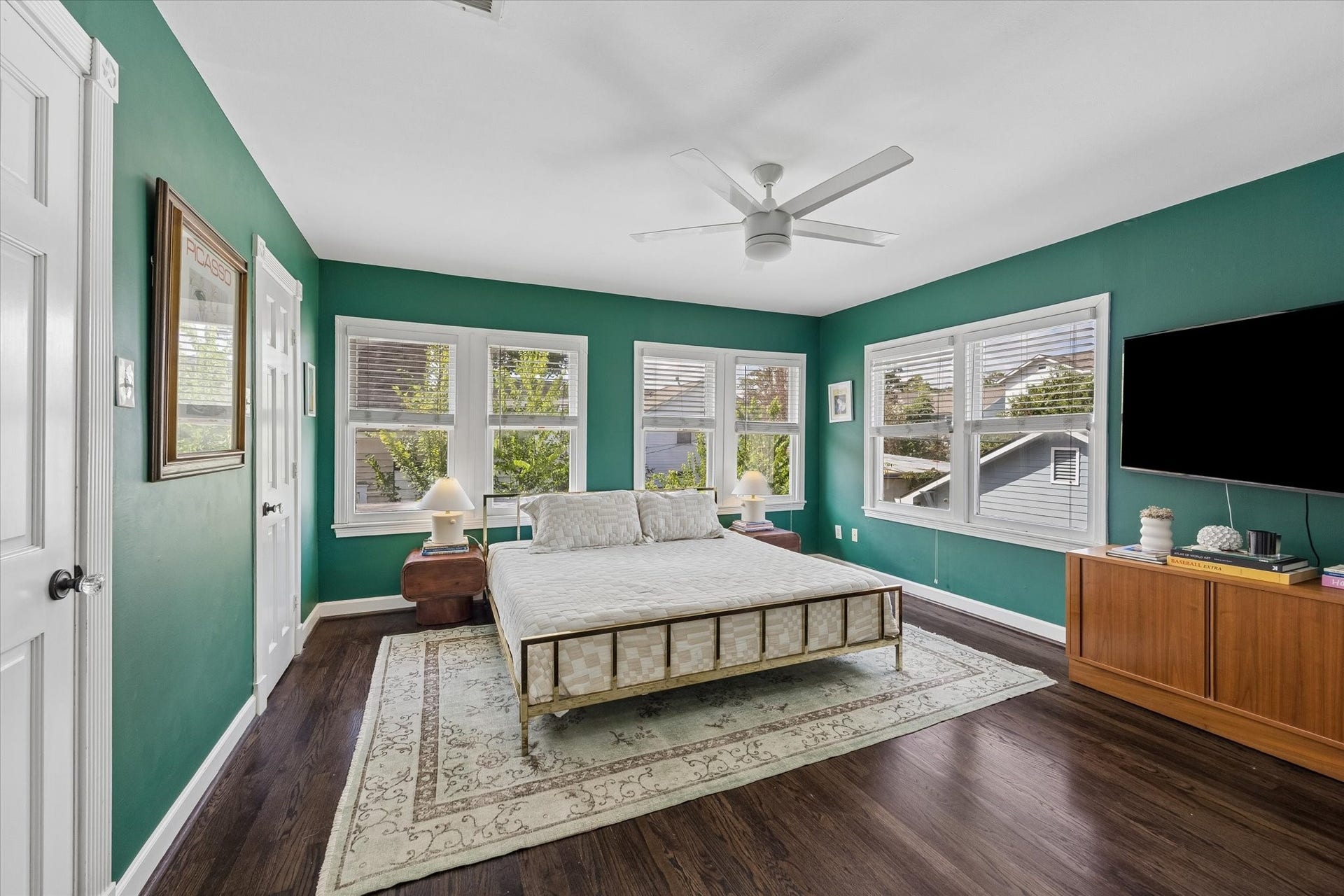 Second floor primary retreat with large windows, great natural light and his and hers closets