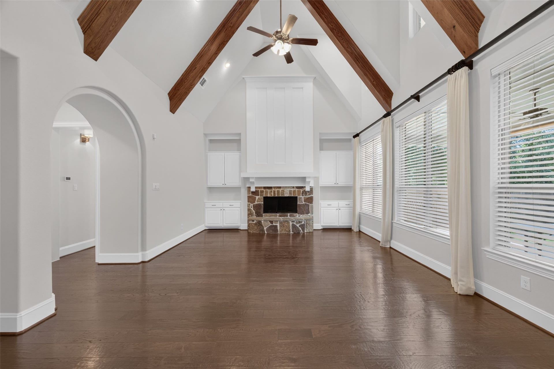 109 Blanton Bend Drive, Montgomery, TX 77316 Living room with fireplace and beamed ceiling