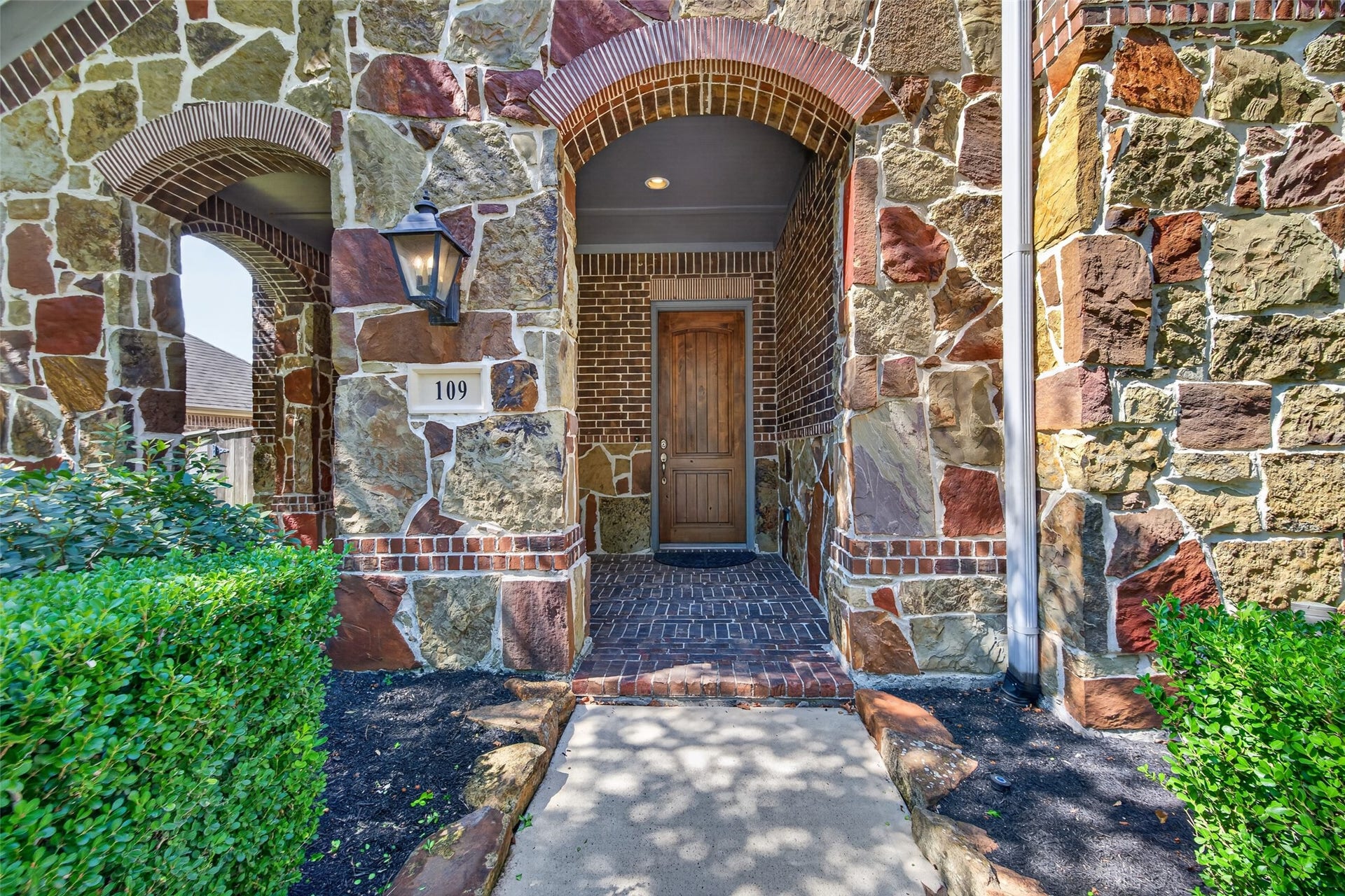 109 Blanton Bend Drive, Montgomery, TX 77316 Beautiful wooden front door and porch
