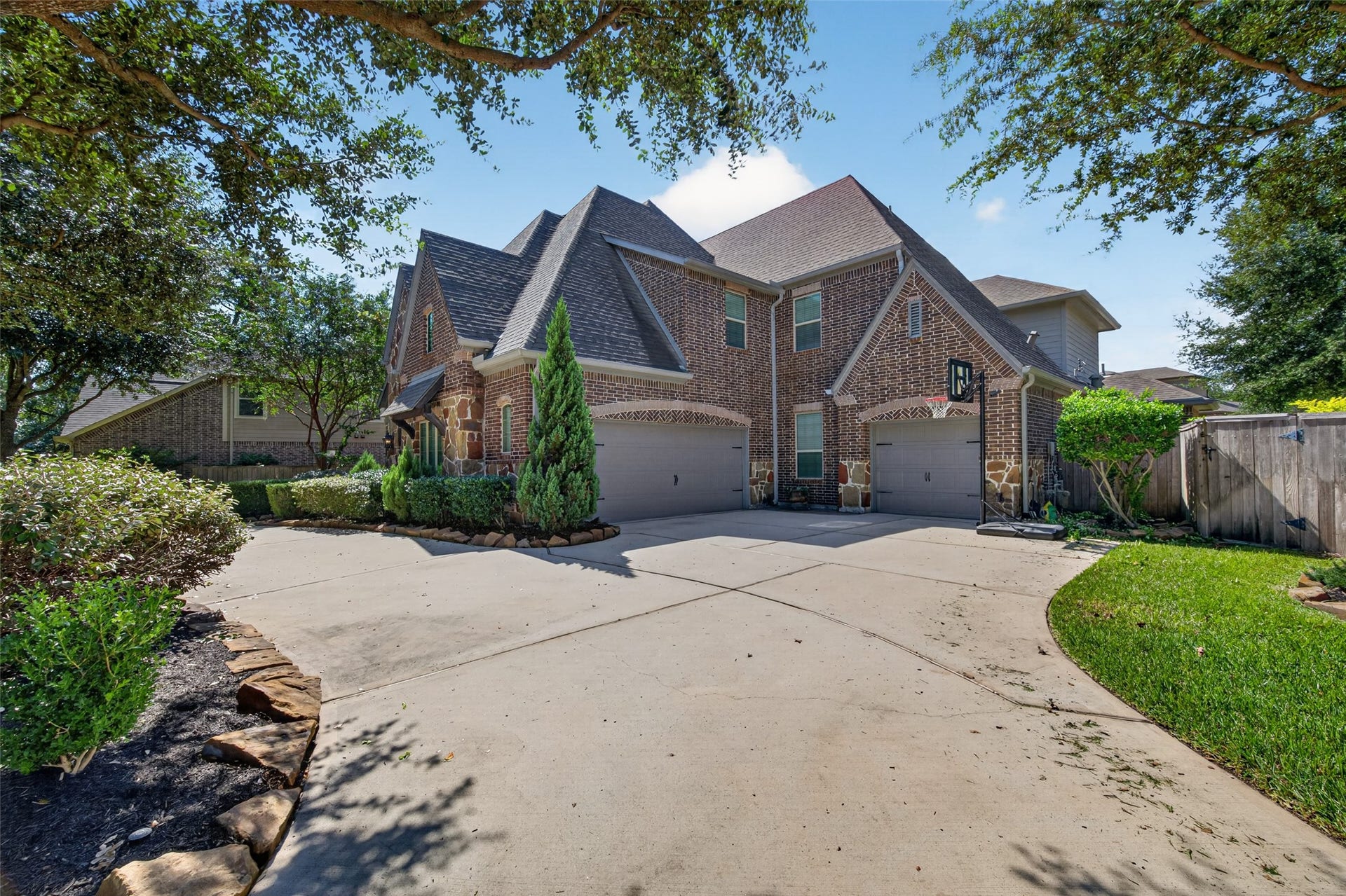 109 Blanton Bend Drive, Montgomery, TX 77316 View of 3 car garage & spacious driveway