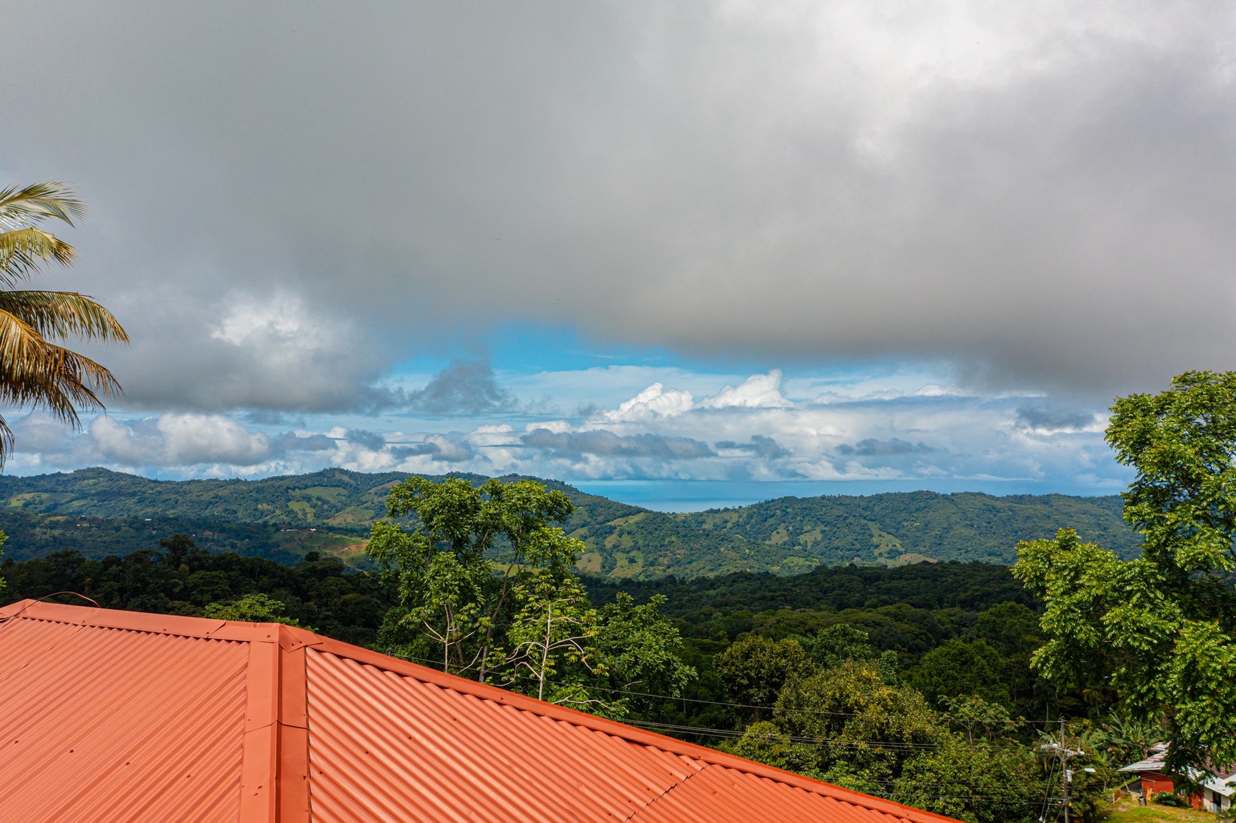 Mountain-Side Oasis: Spectacular Ocean View Property with Endless Investment Potential — photo 6 of 19