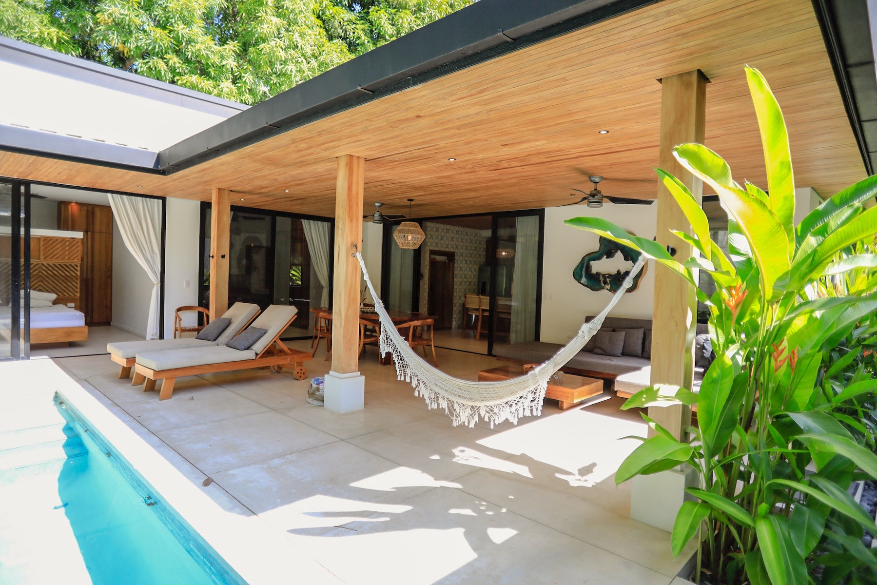 Tropical Modern Home Steps to the Surf — photo 16 of 19