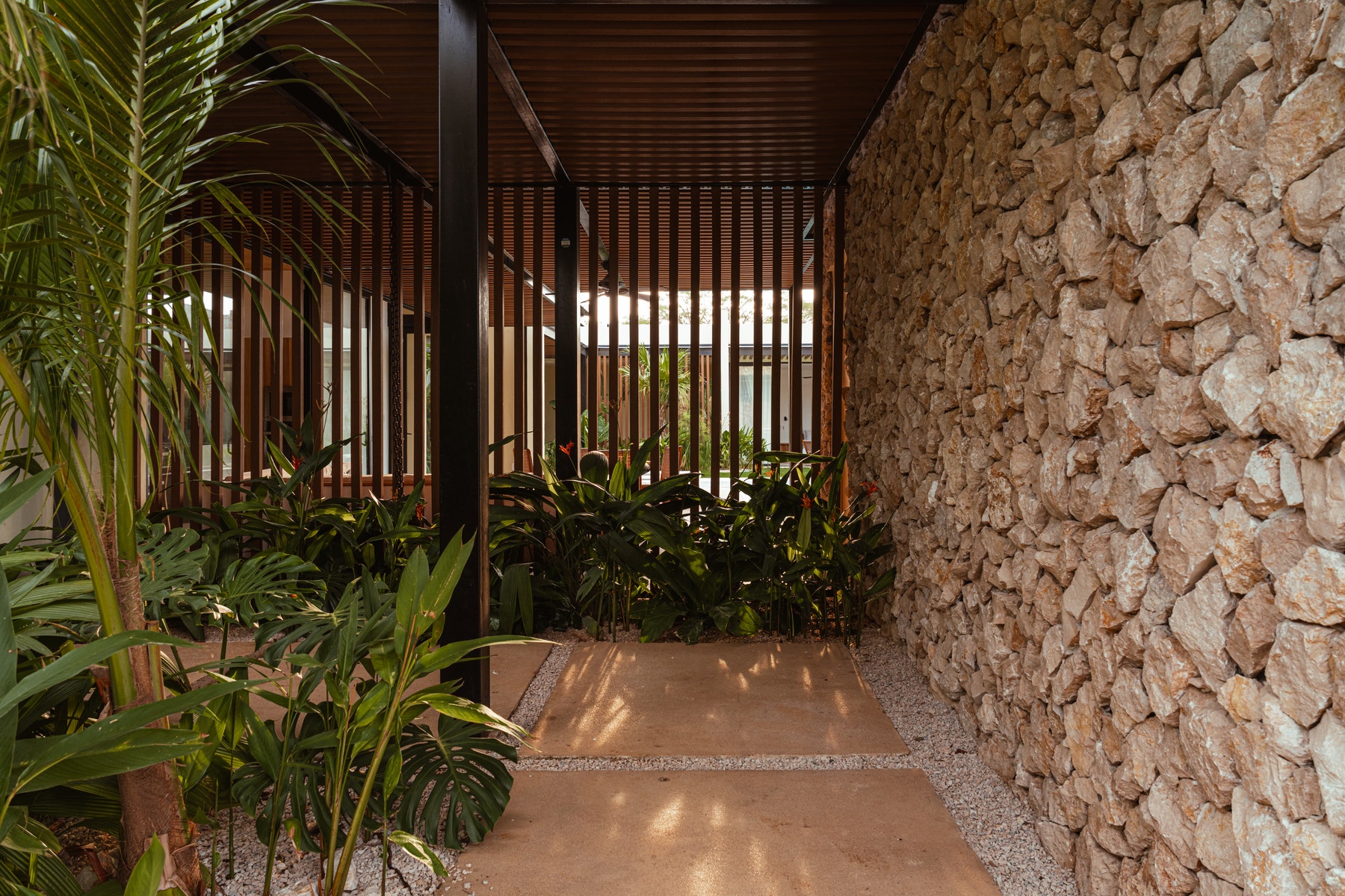 Tropical Modern Four Bedroom Home — photo 7 of 19