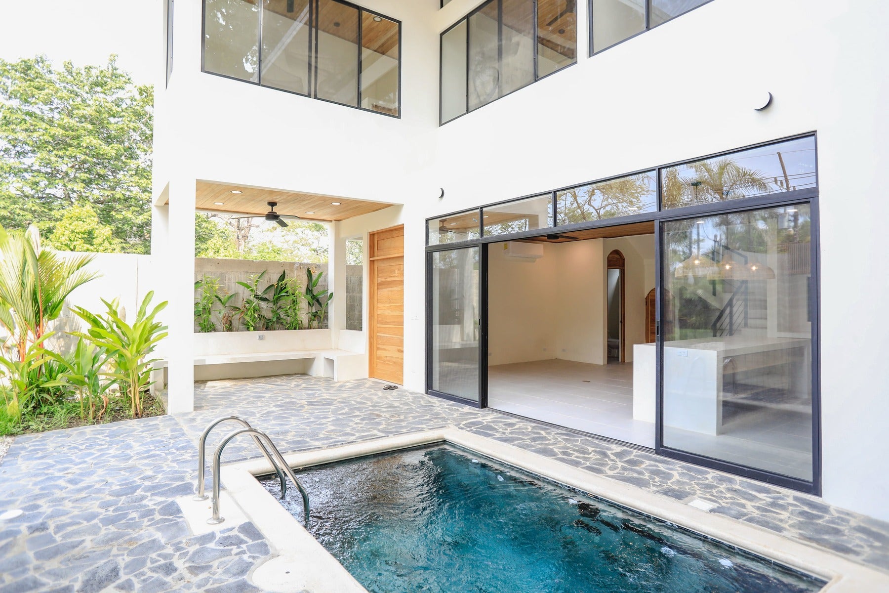 Walk To The Beach Three Bedroom Home — photo 4 of 9