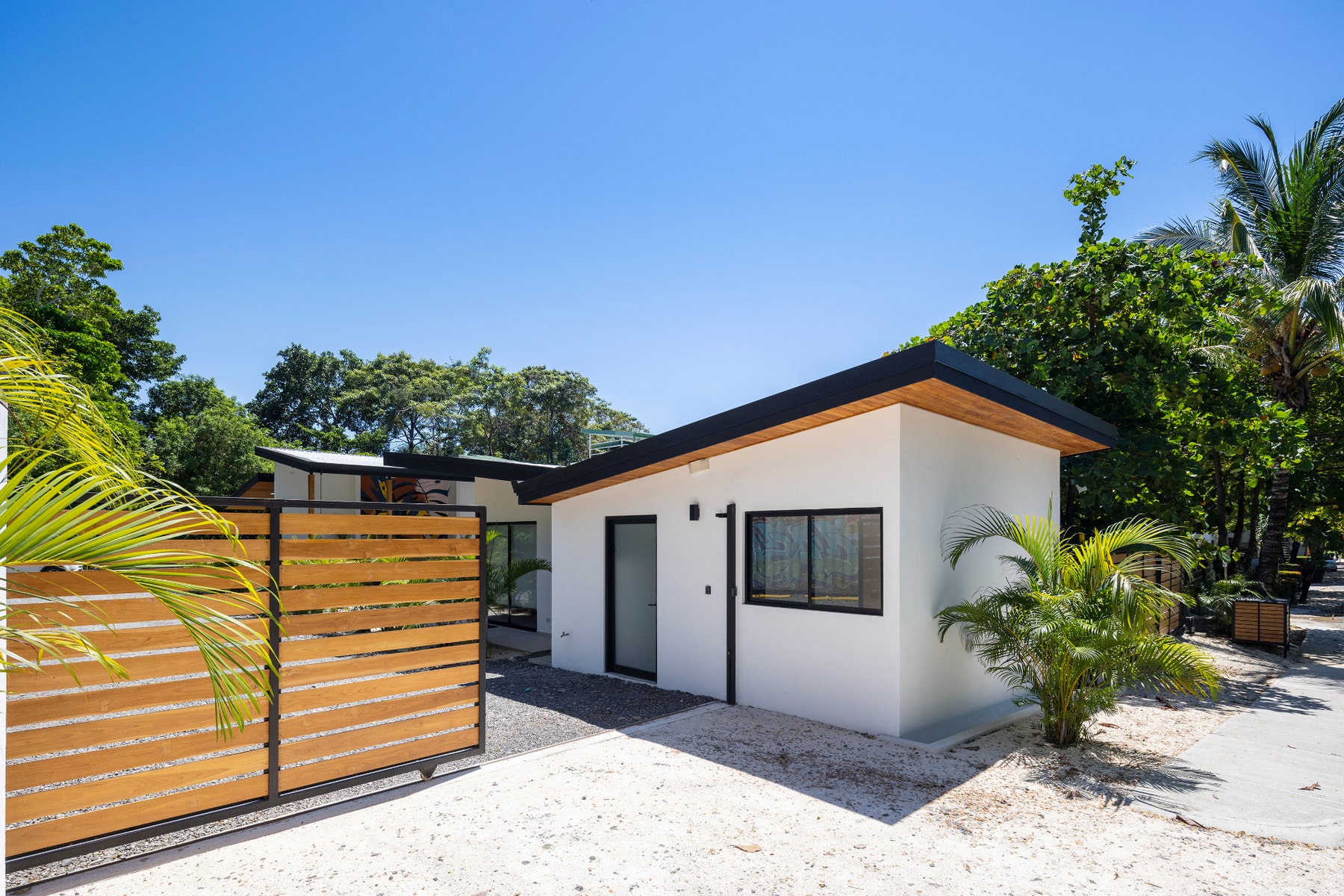 Modern Multi Unit Walk to the Beach — photo 4 of 19