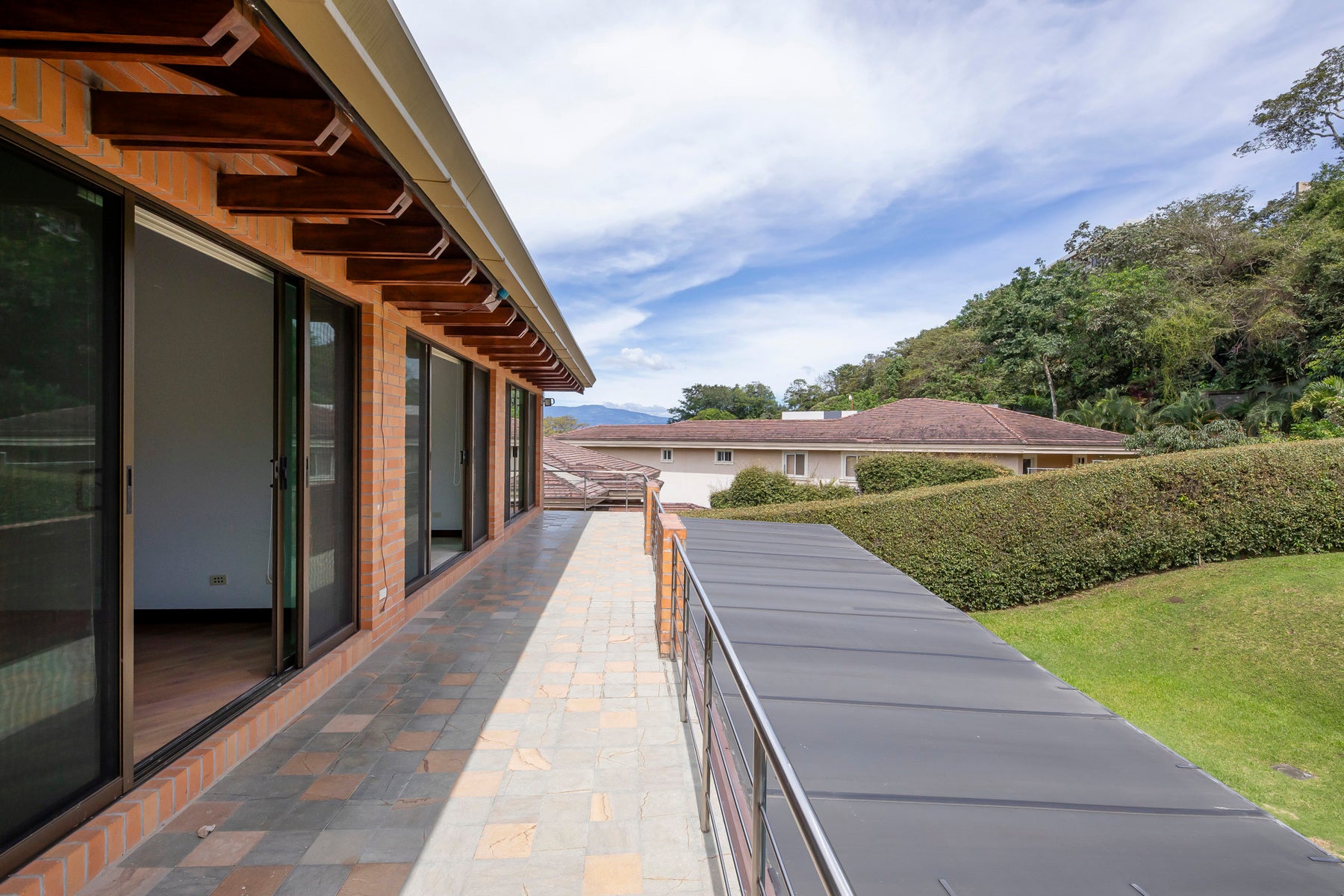 Elegant Four-Bedroom Home with Terrace and Views — photo 10 of 19
