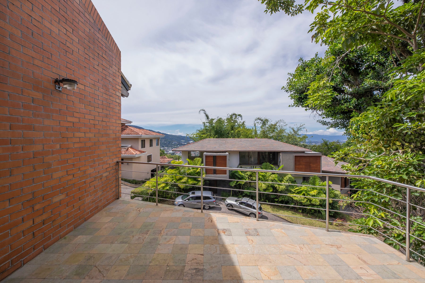 Elegant Four-Bedroom Home with Terrace and Views — photo 18 of 19