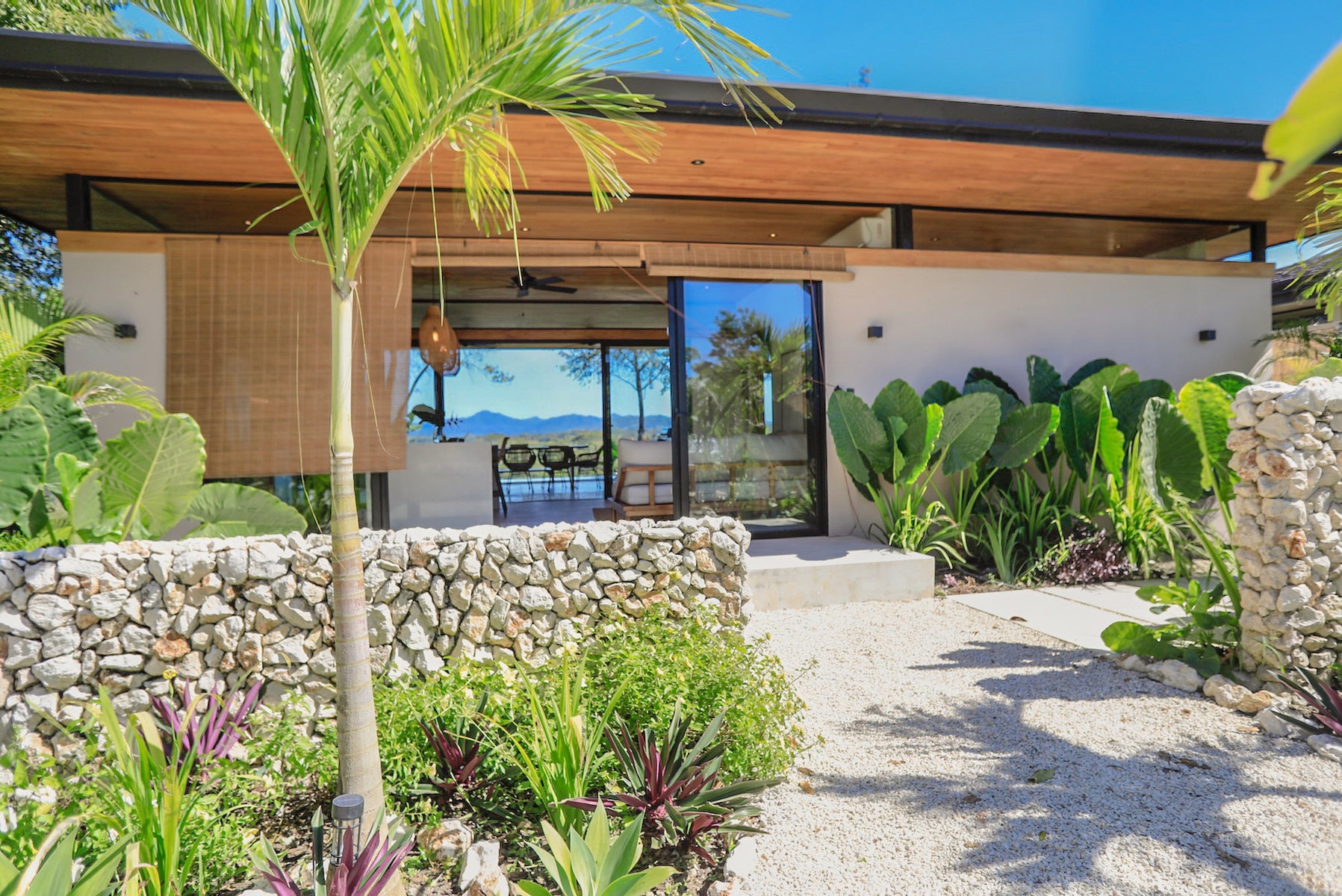 Tropical Modern Home with Expansive Valley Views — photo 7 of 19