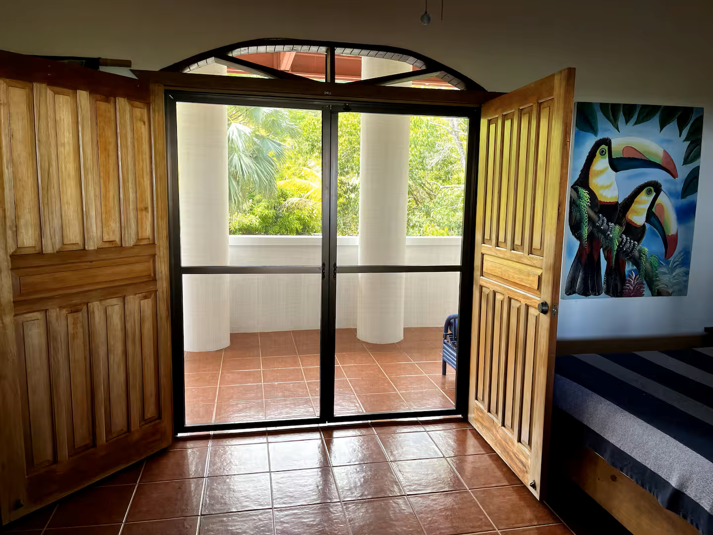 Matapalo Estate home with sunset ocean views and a waterfall — photo 15 of 19