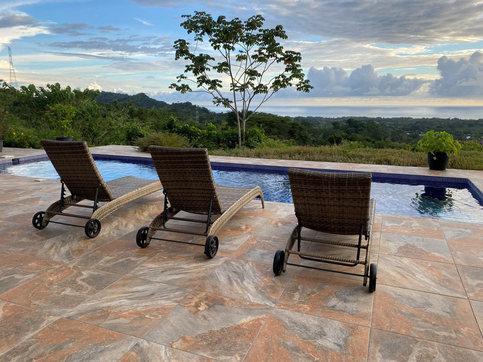 Matapalo Estate home with sunset ocean views and a waterfall — photo 17 of 19