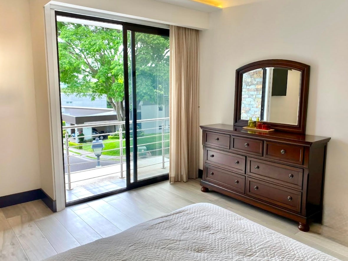 Where Modern Architecture meets the Warmth of Community Bosques de Carao — photo 9 of 19
