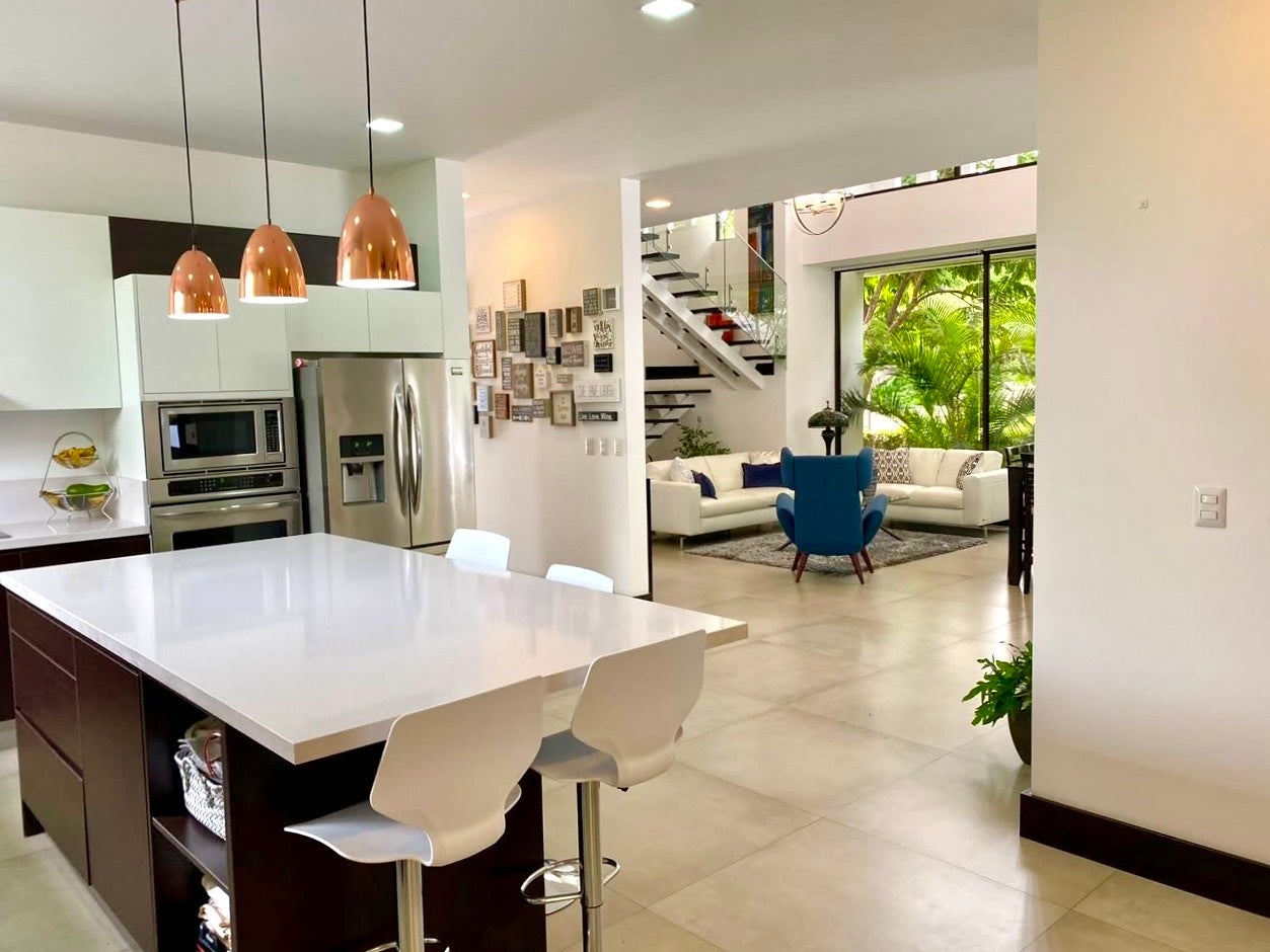 Where Modern Architecture meets the Warmth of Community Bosques de Carao — photo 4 of 19