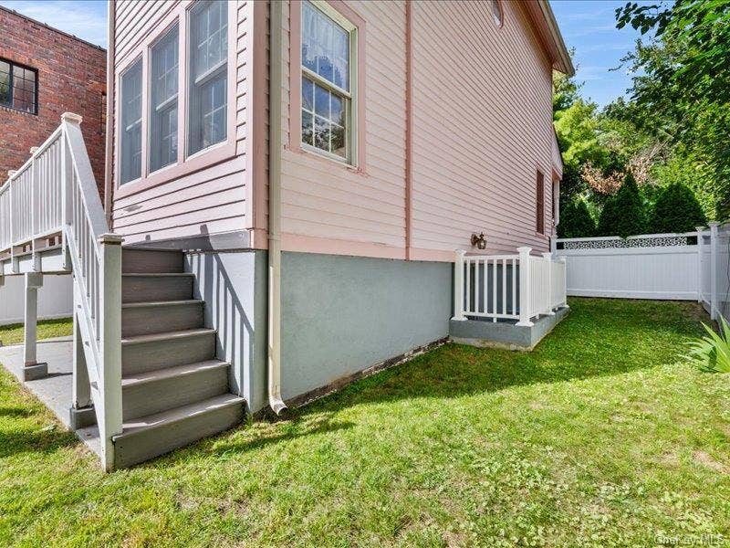 39 12th Avenue, Sea Cliff, NY 11579 Stairs from deck and also to basement.