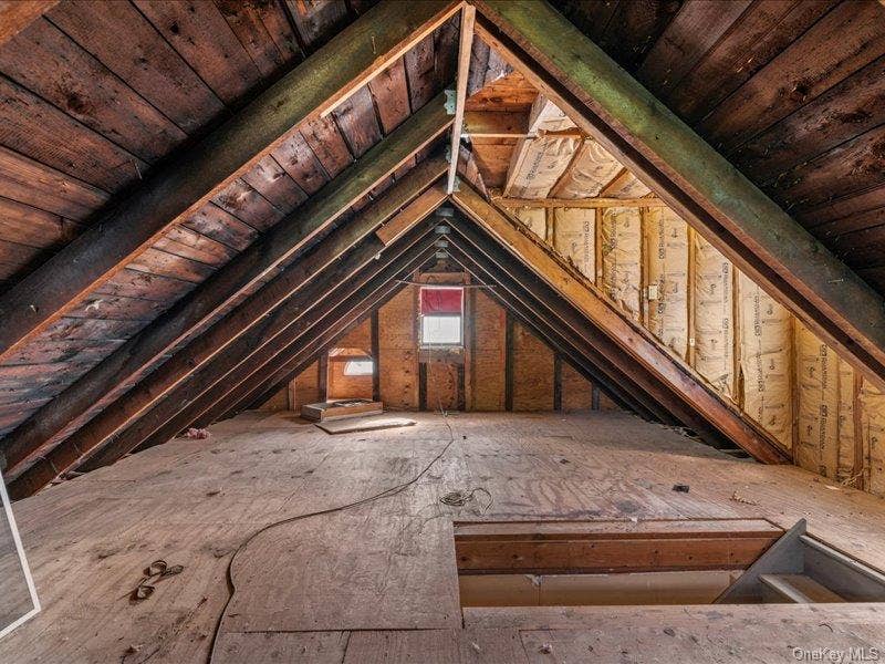 39 12th Avenue, Sea Cliff, NY 11579 Full walk-up attic with plywood flooring throughout.