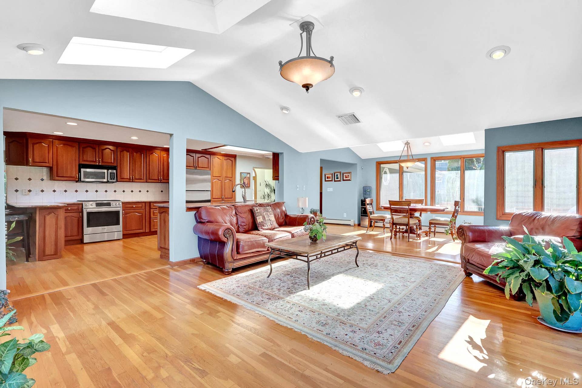 9 Shipyard Lane, Setauket, NY 11733 den with aliding doors onto patio & SKYLIGHTS
