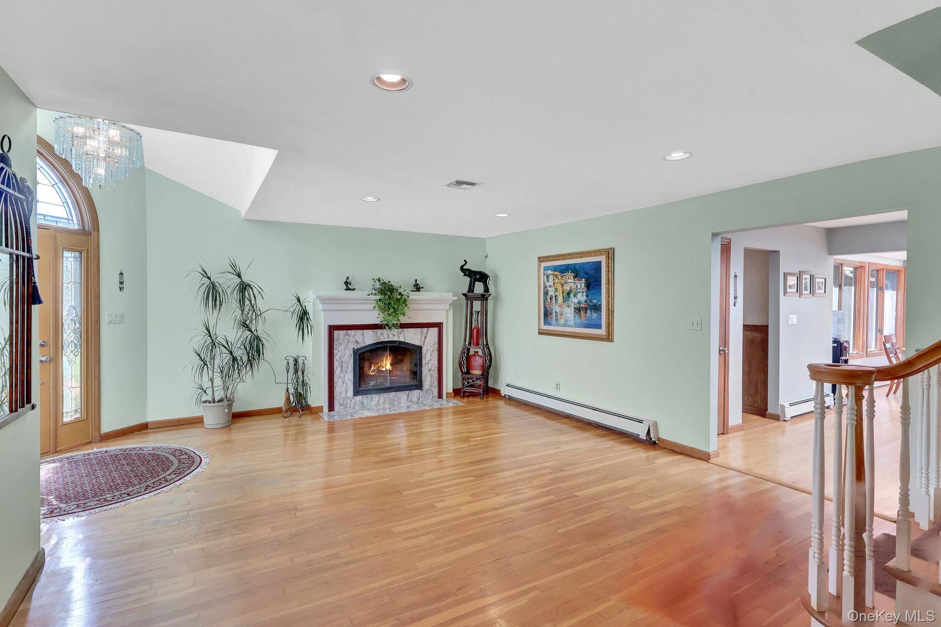 9 Shipyard Lane, Setauket, NY 11733 enter into a lounge area with fireplace