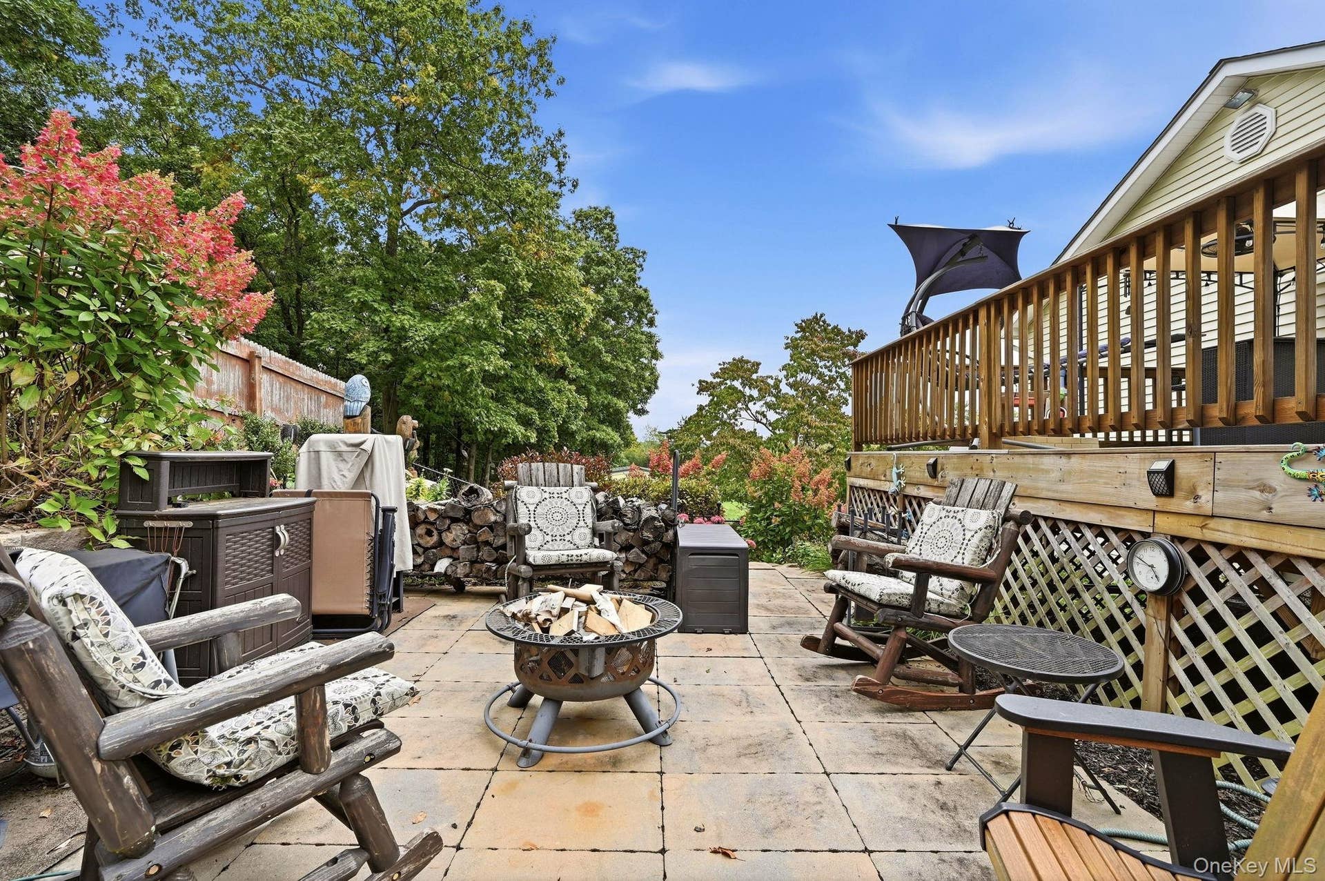 161 Highland Avenue, Monroe, NY 10950 The rear of the home opens to an inviting outdoor setting with room to enjoy the property.