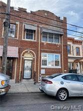 3138 103rd Street, #2ND FL, Corona, NY 11368 Brick facade with decorative arched entryway