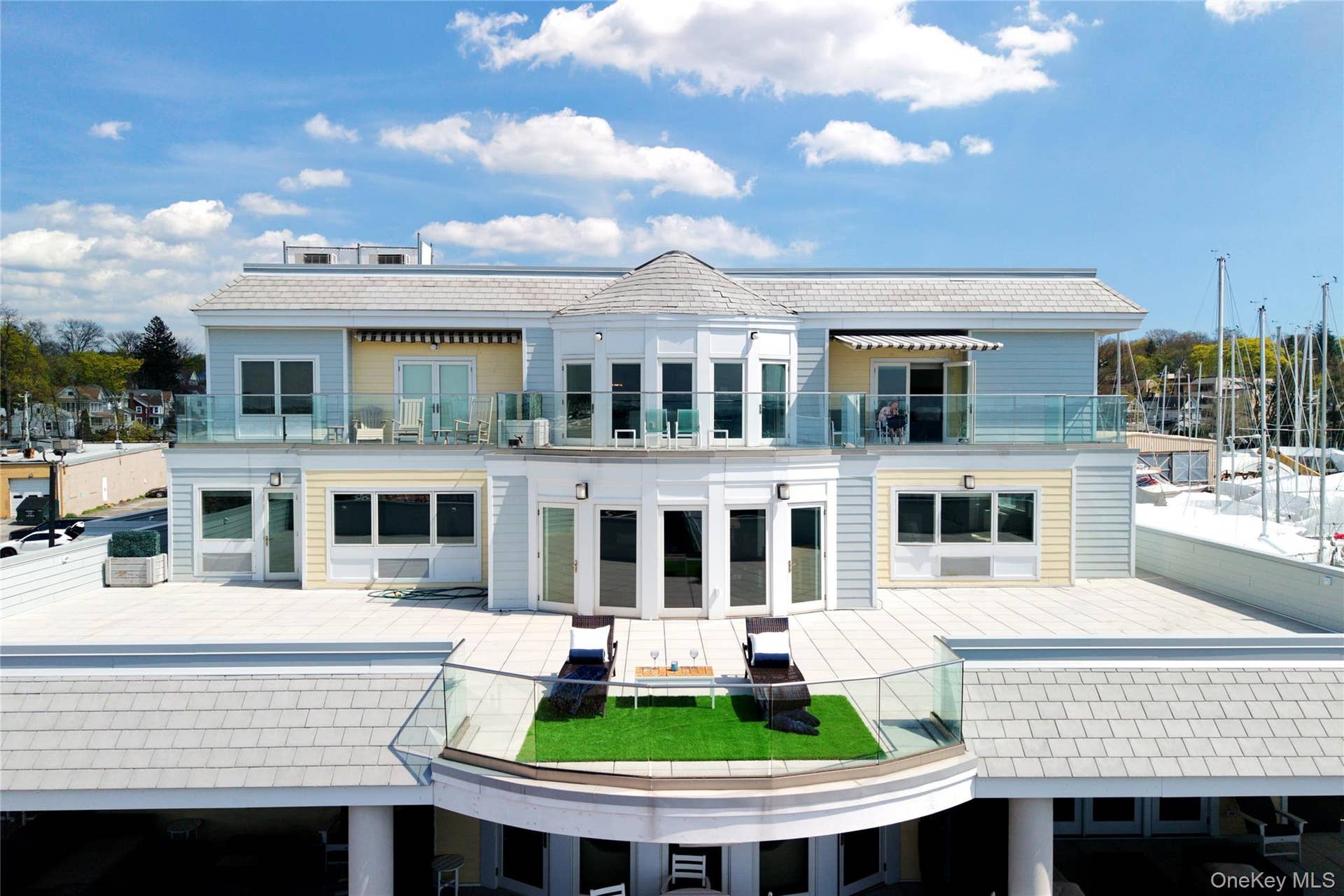 Private patio of unit 212 spans 27,882 Sq. Ft.With magnificent water views.