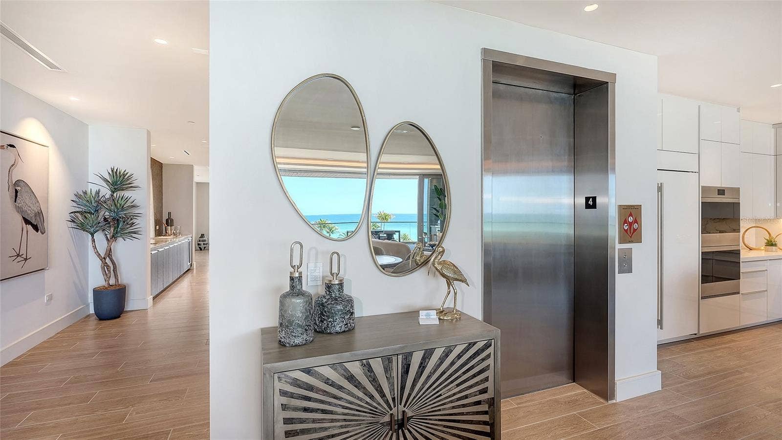 1561 GULF OF MEXICO DRIVE, #403, Longboat Key, FL 34228 Elevator opens into the Great Room